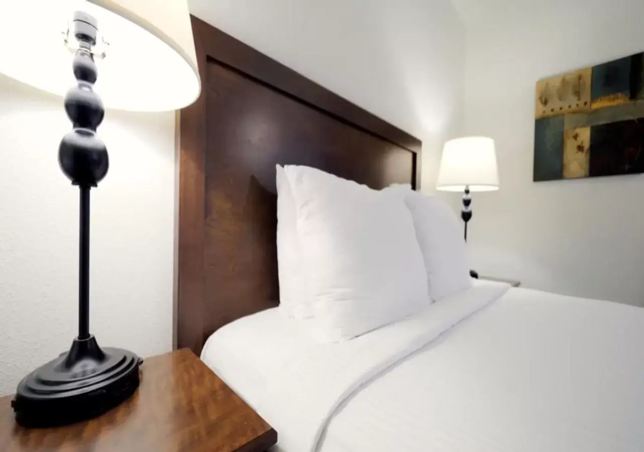 Bed in Los Abrigados Resort and Spa
