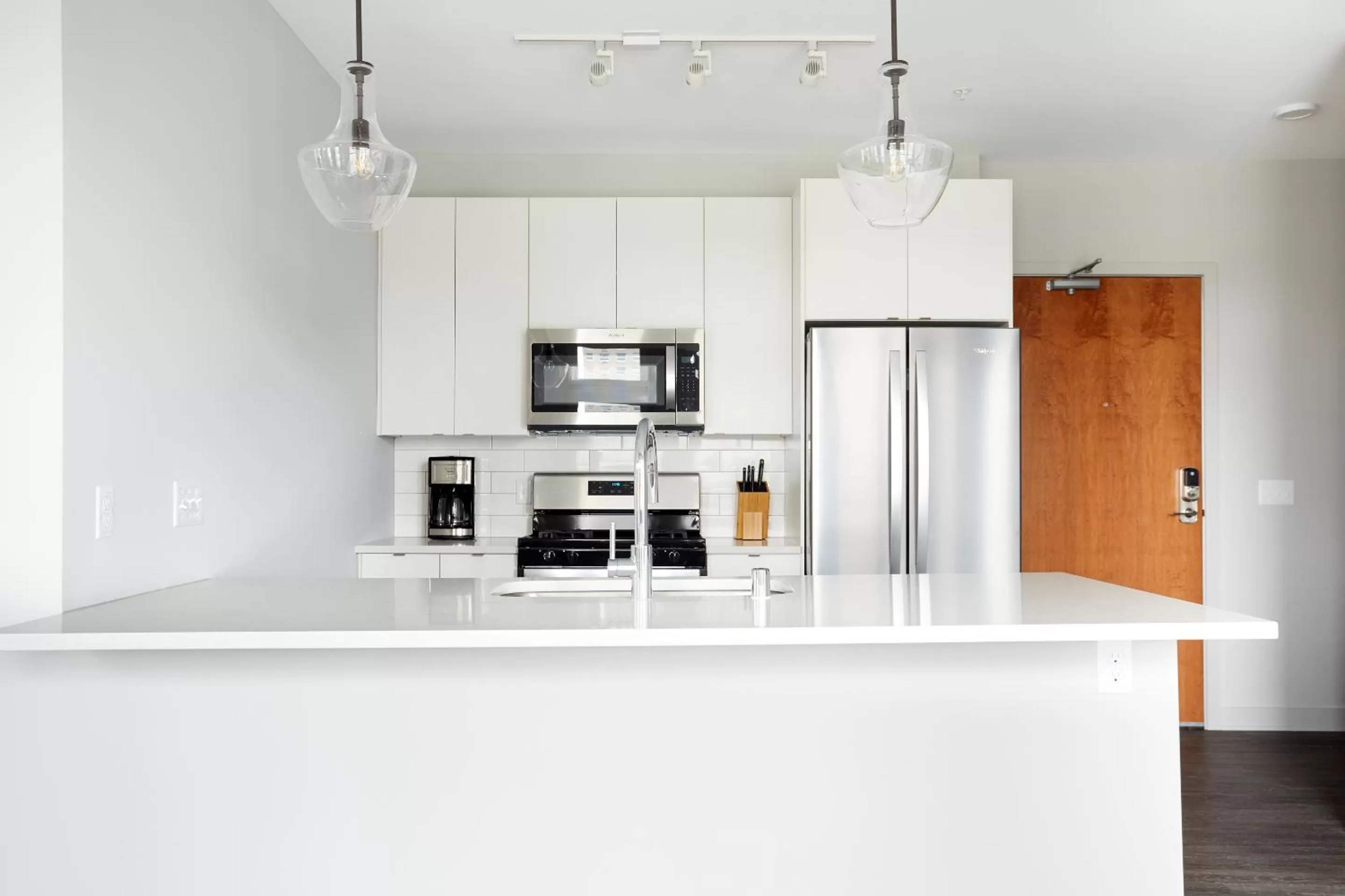 Living room, Kitchen/Kitchenette in Sonder at LUNA