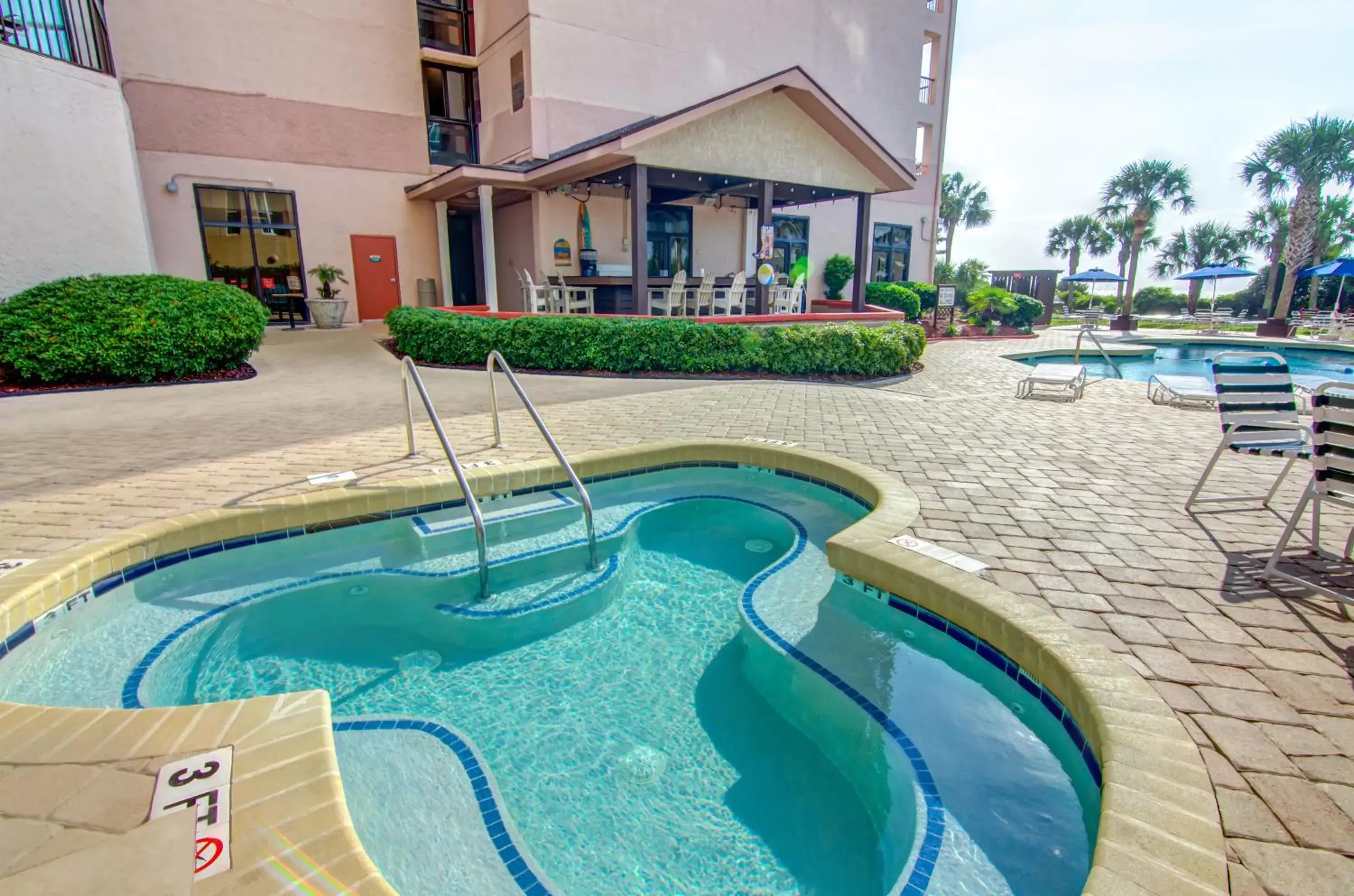 Hot Tub, Swimming Pool in Beach Colony Resort