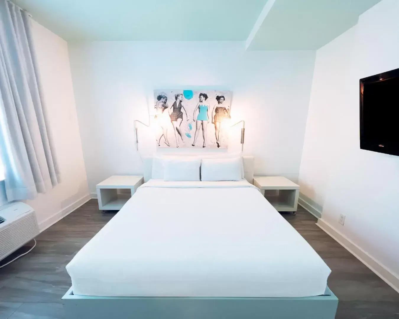 Bed in Aqua Hotel