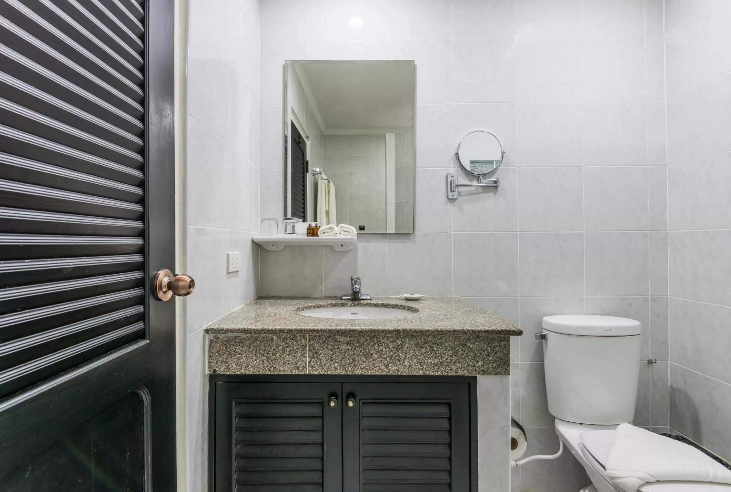 Toilet in The Ambiance Hotel