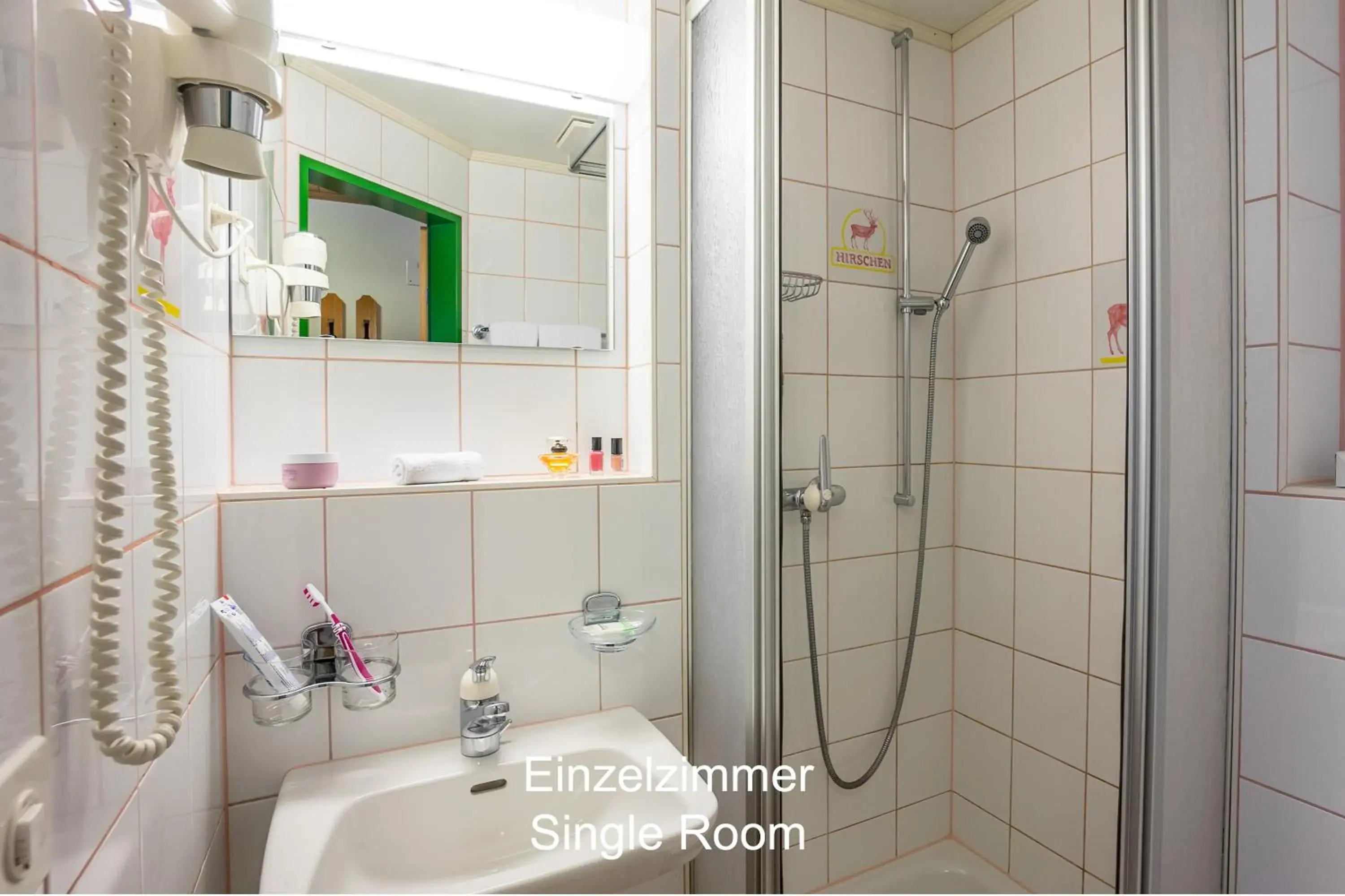 Shower, Bathroom in Hotel Hirschen - Grindelwald