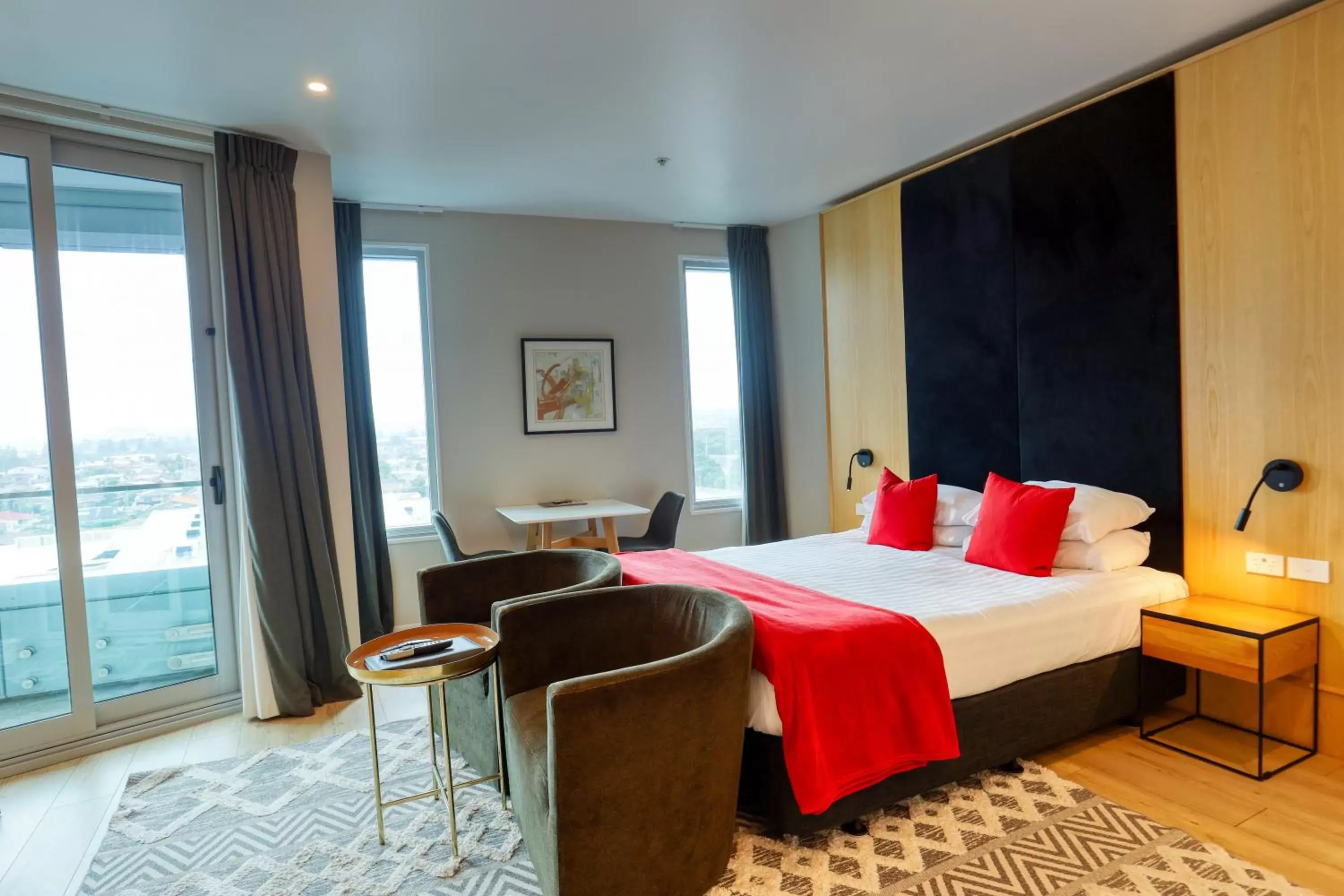 Bedroom in Ramada Suites by Wyndham Nautilus Orewa