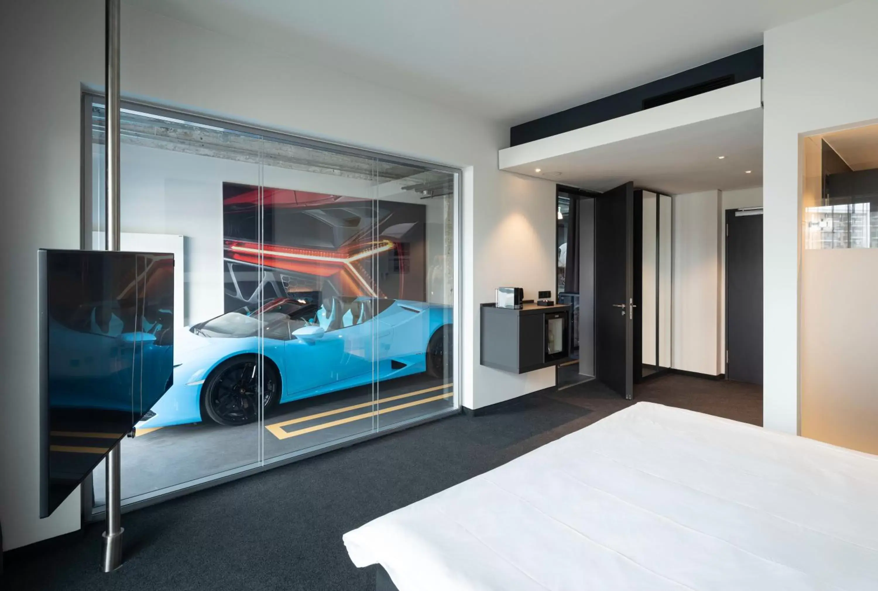 Photo of the whole room, Bed in V8 Hotel Köln at MOTORWORLD