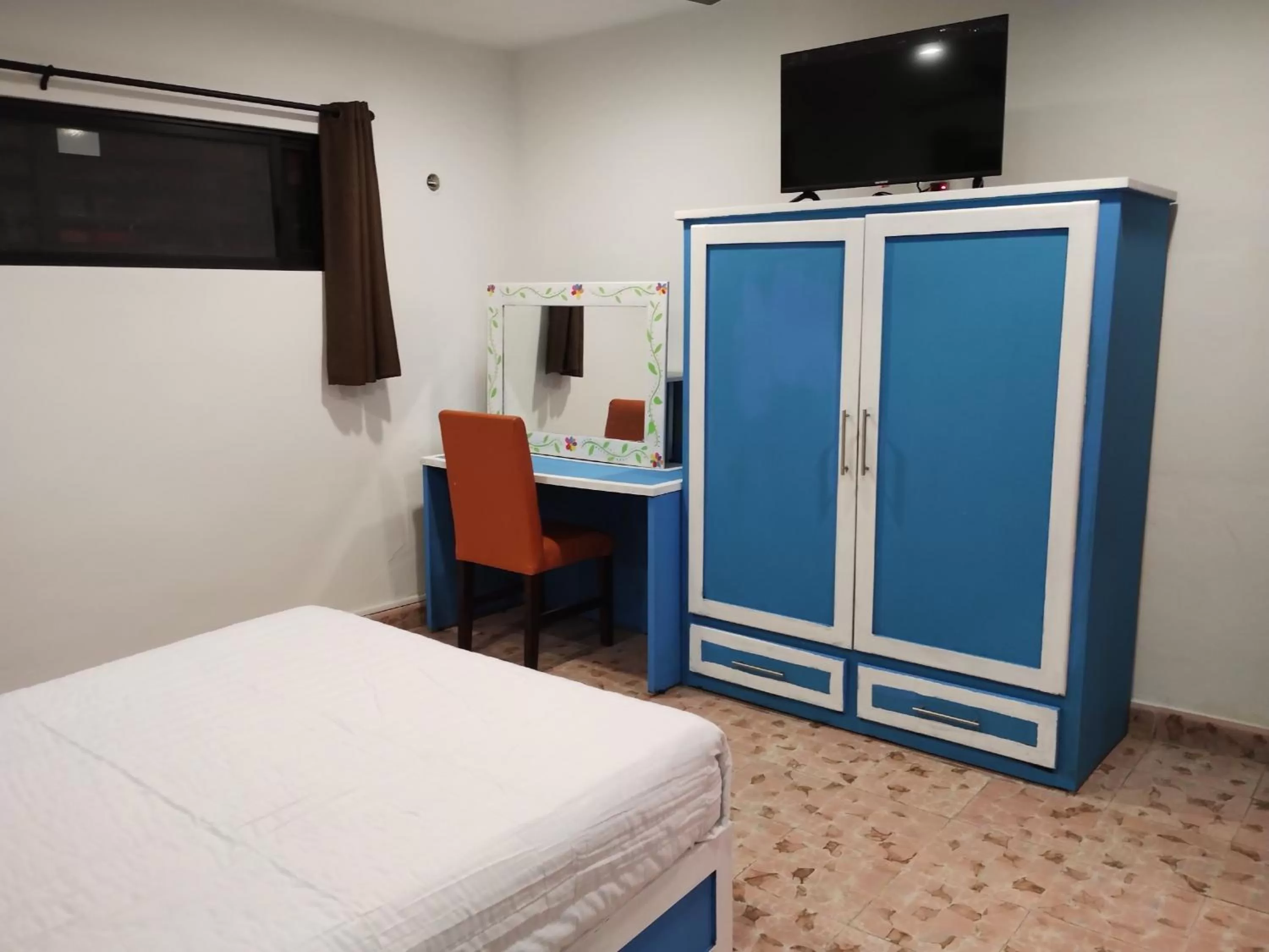 Bed in T´úubul K´iin Bed & Breakfast