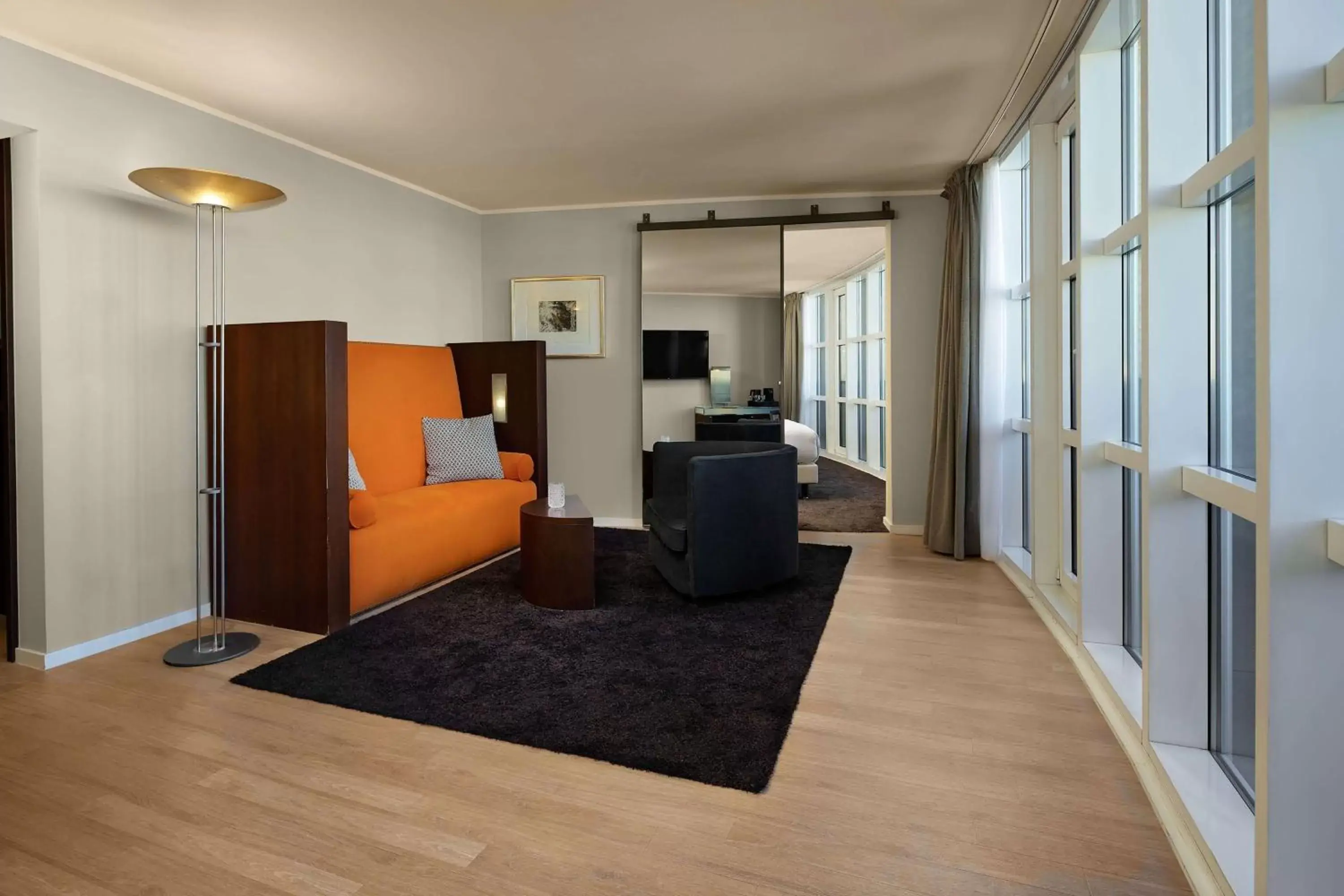 Living room in Wasserturm Hotel Cologne, Curio Collection by Hilton