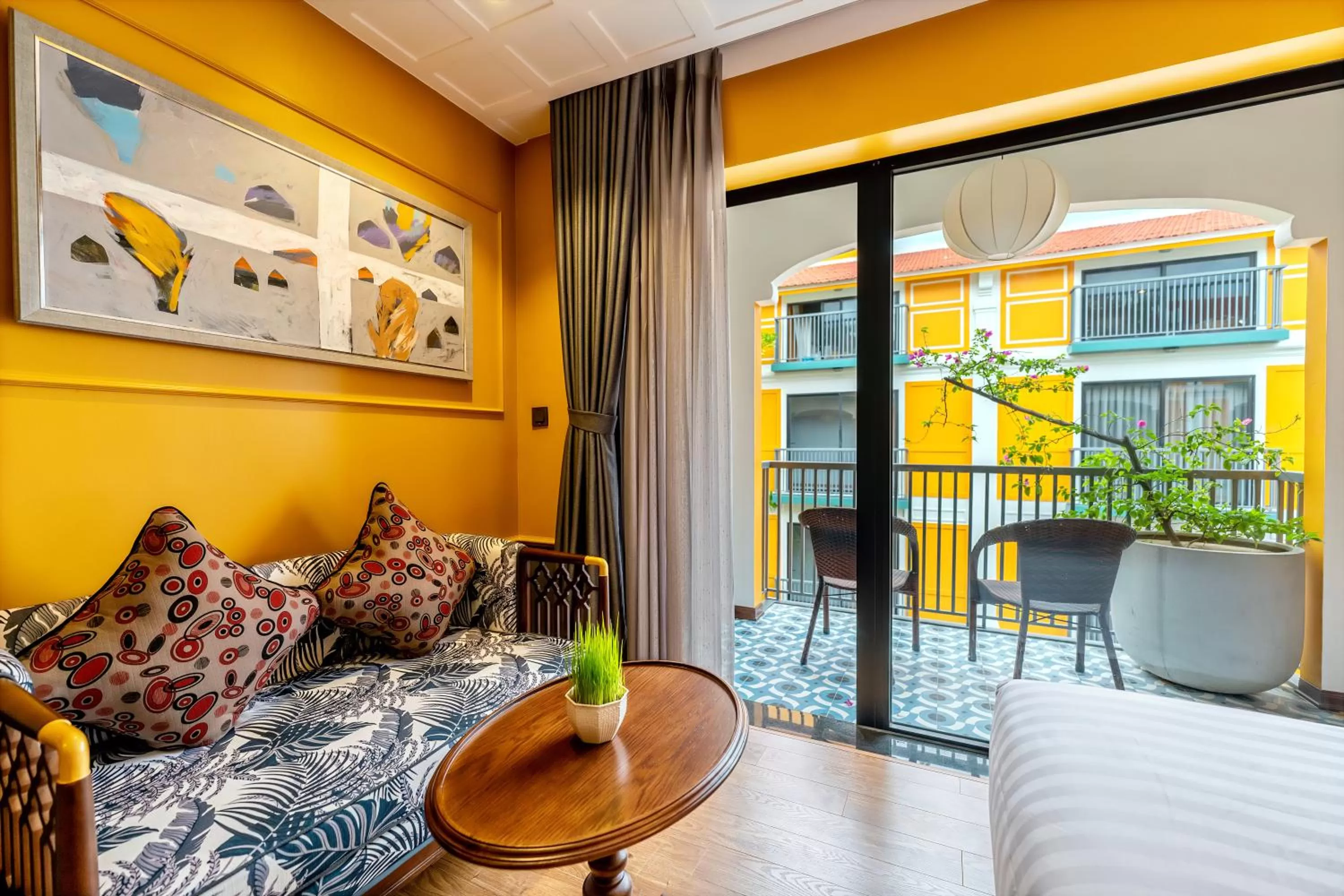 Seating area, Bed in Son Hoi An Boutique Hotel & Spa