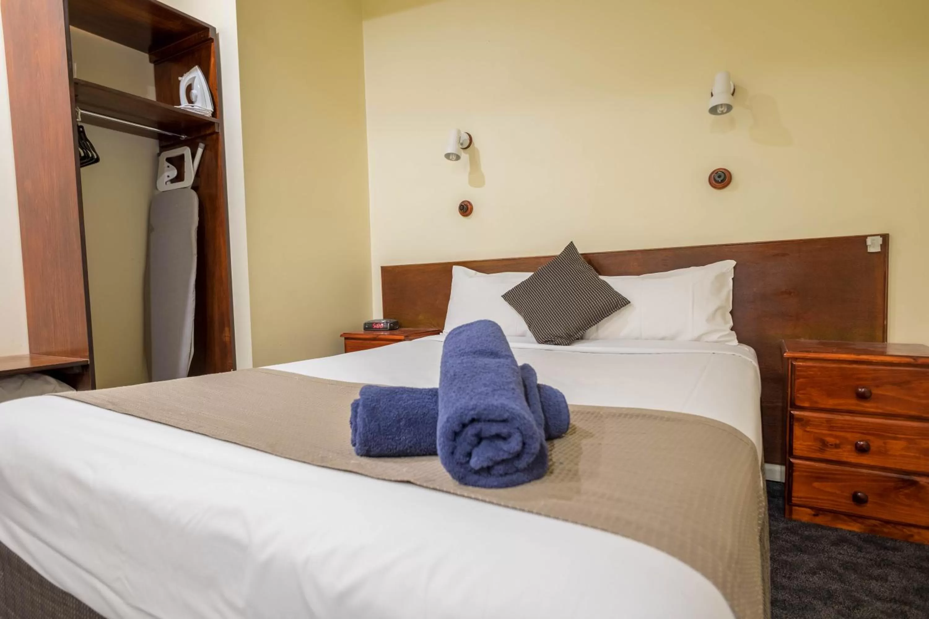 Bed in Pioneer Station Motor Inn