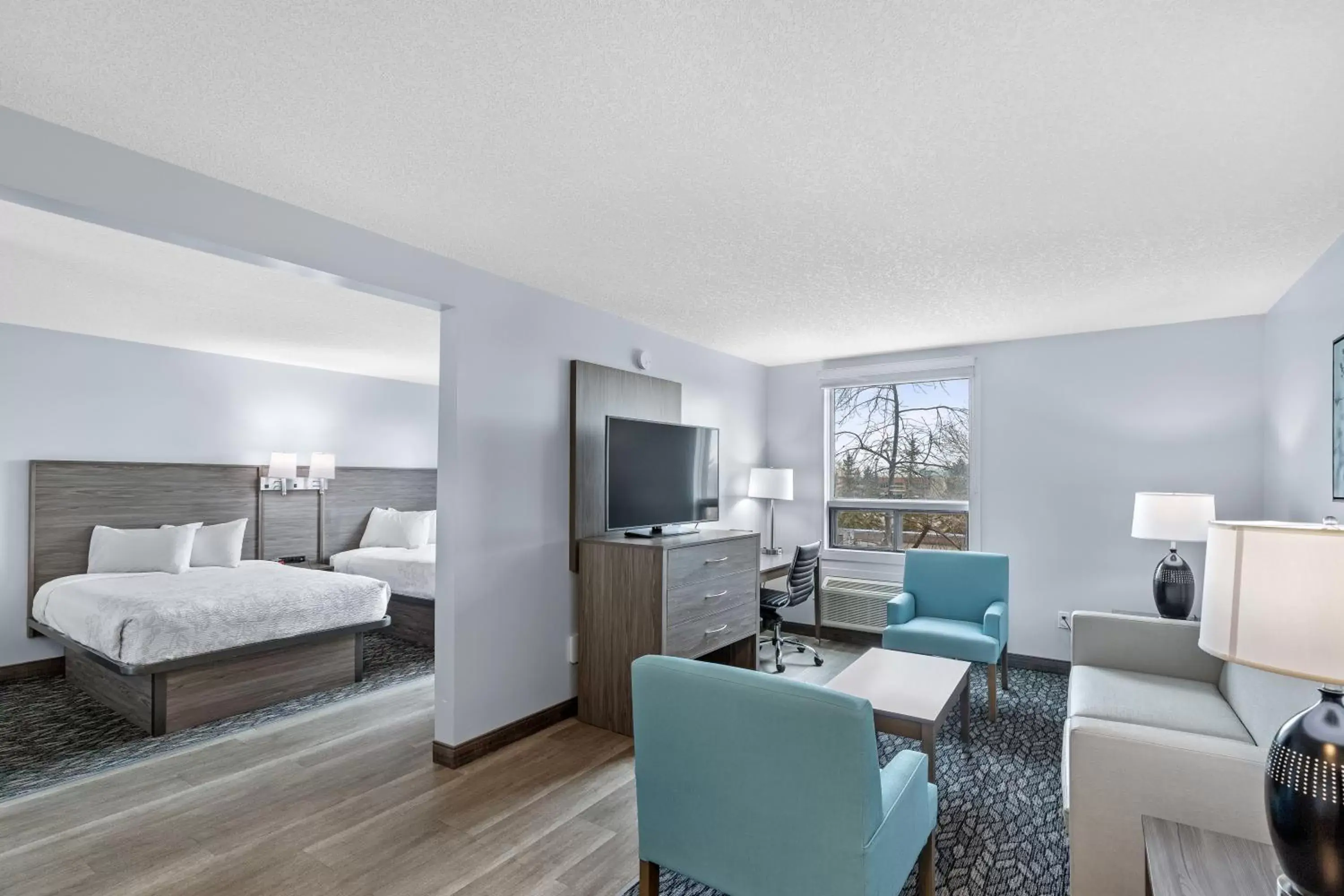 Living room in Emerald Hotel & Suites Calgary Airport
