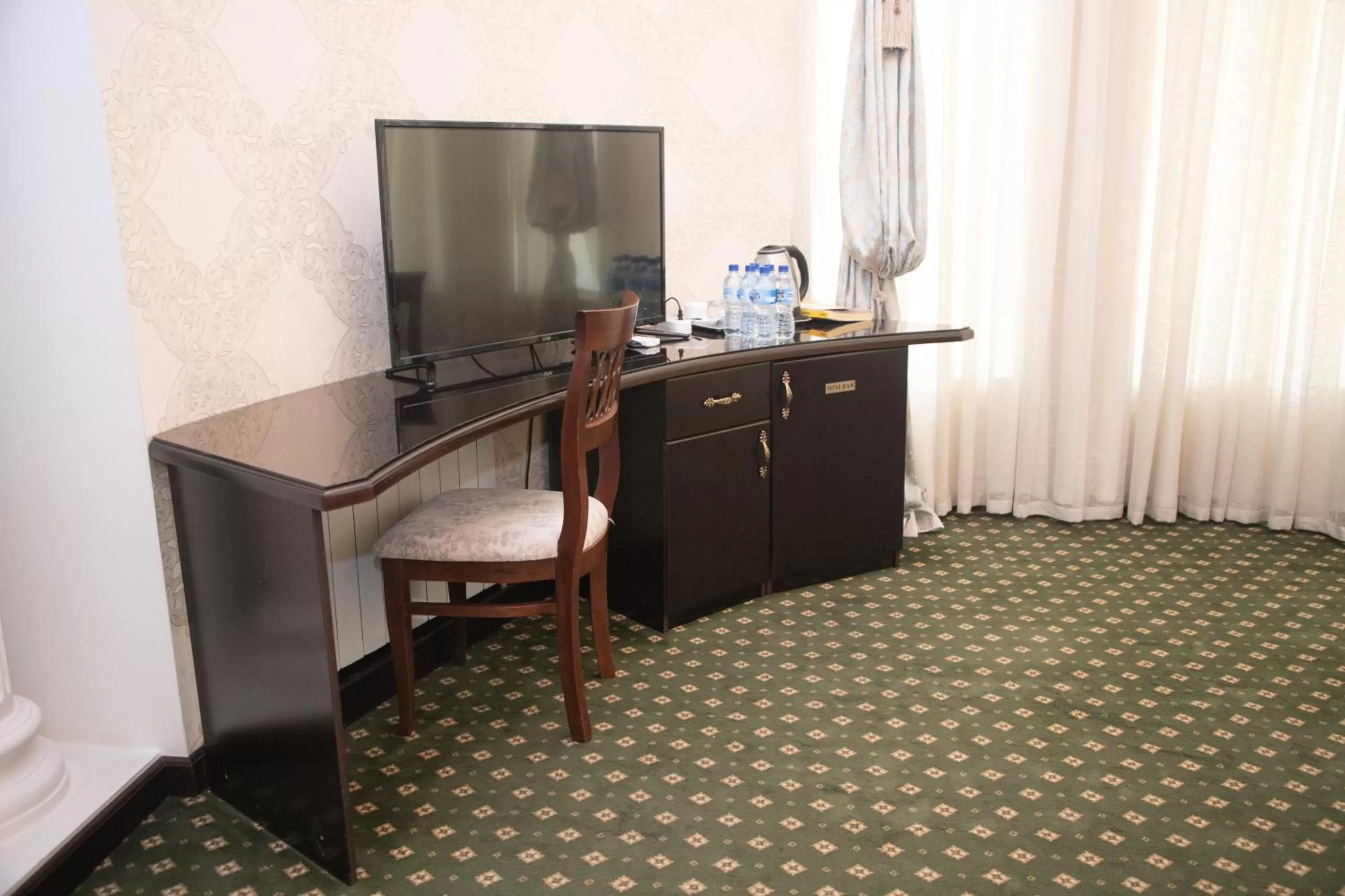 Communal lounge/ TV room in Gloria Hotel