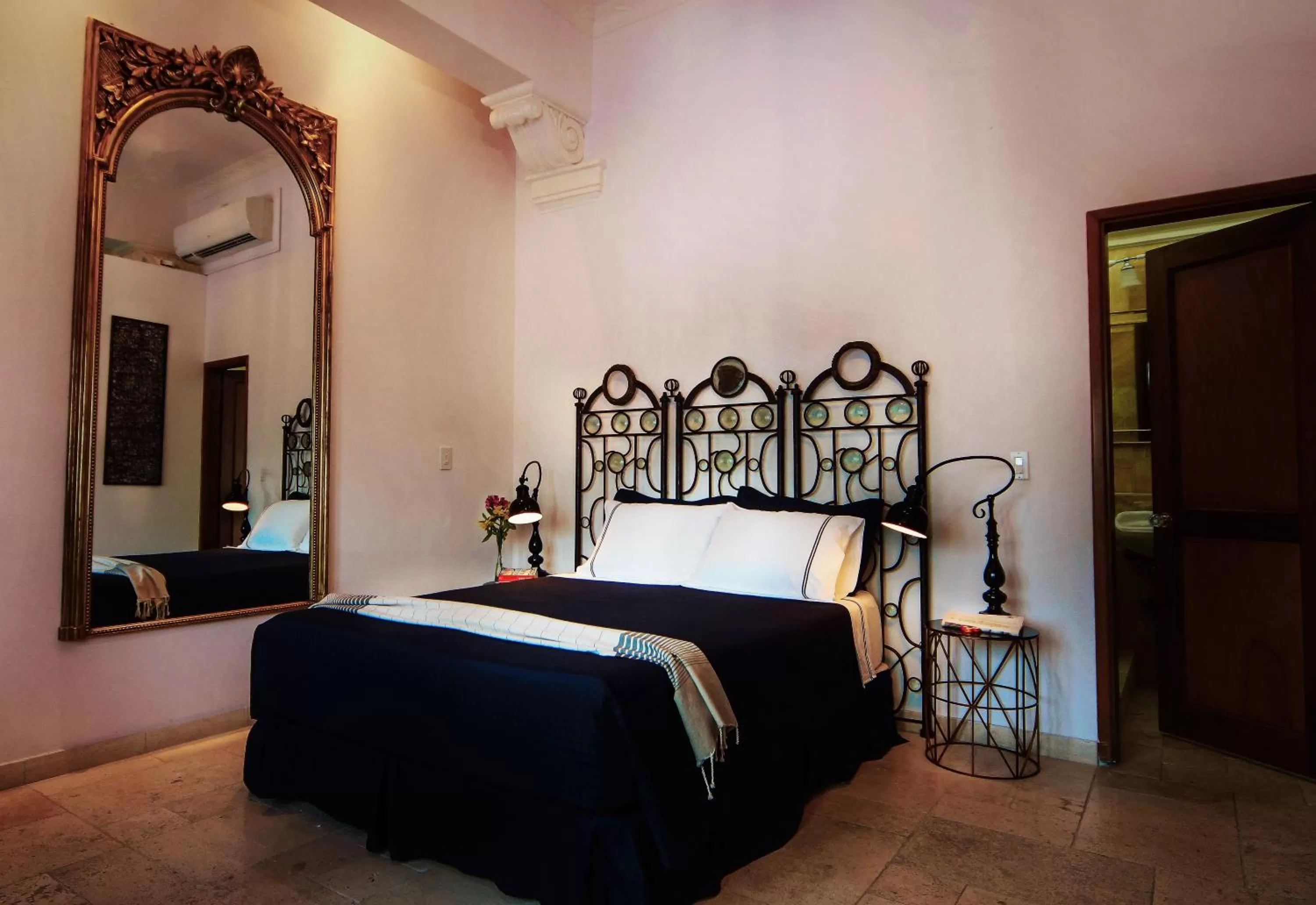 Bed in La Isabela Suites