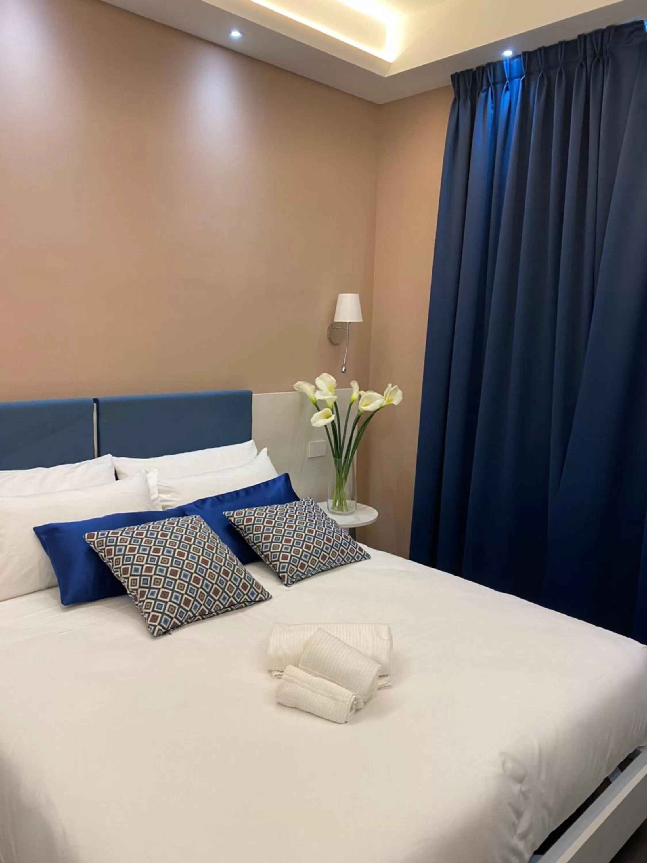 Bed in Palazzo Cappuccini Art Relais