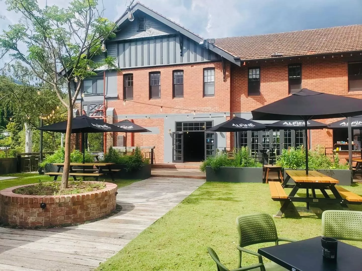 Property building in Alpine Hotel, Eat Drink Sleep