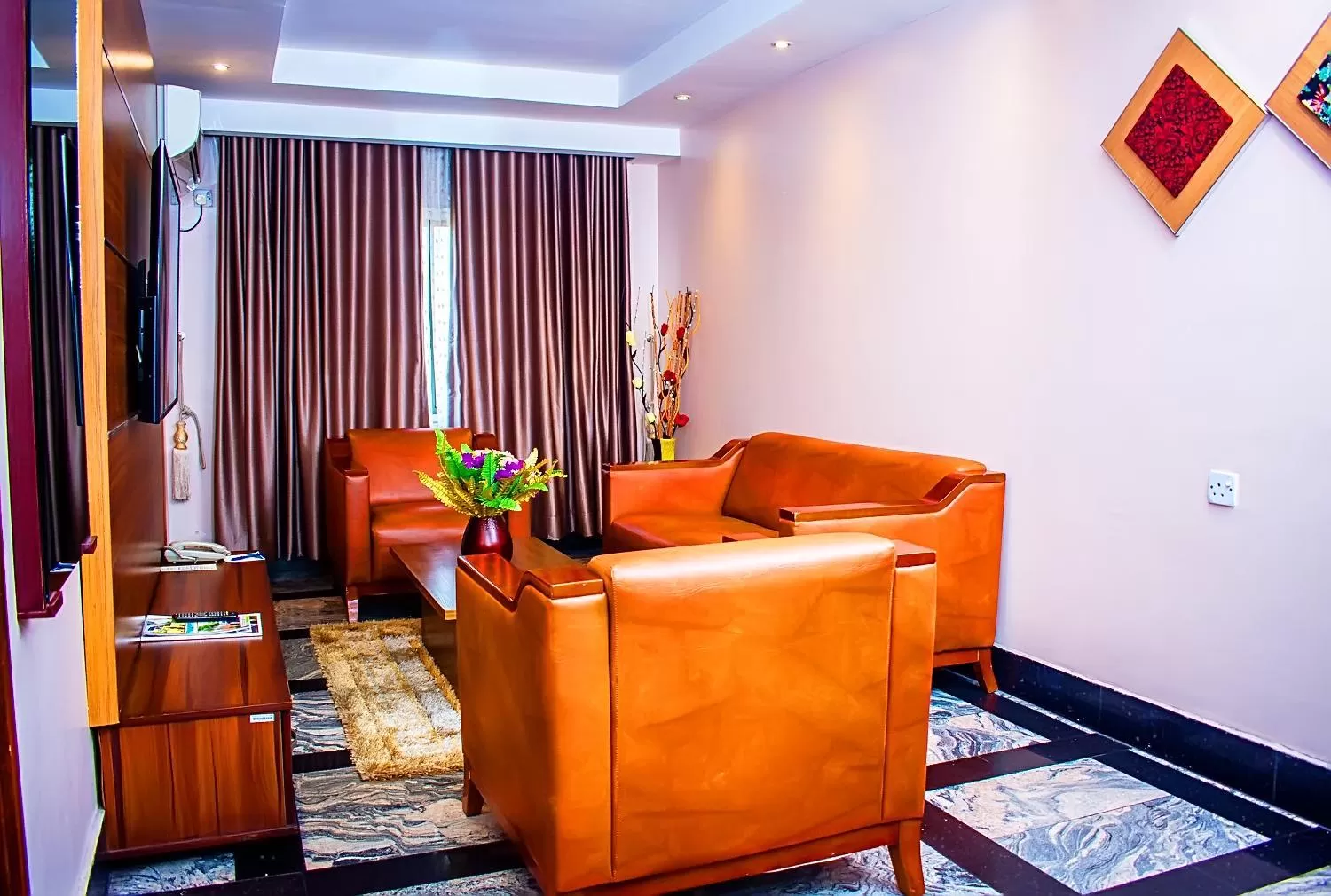 Seating area in Golden Tulip Garden City Hotel - Rivotel