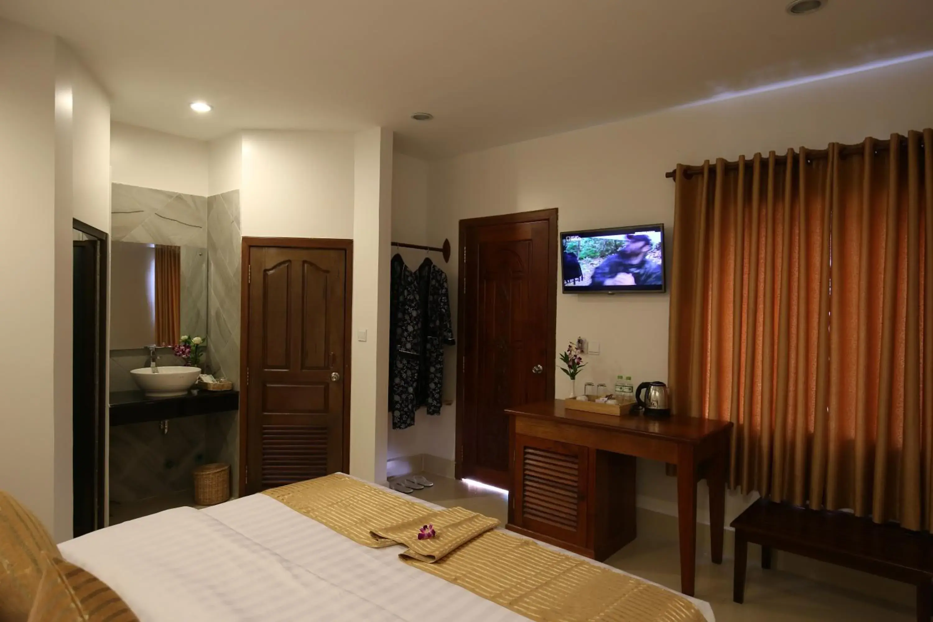 Bed, Room Photo in Holy Angkor Hotel