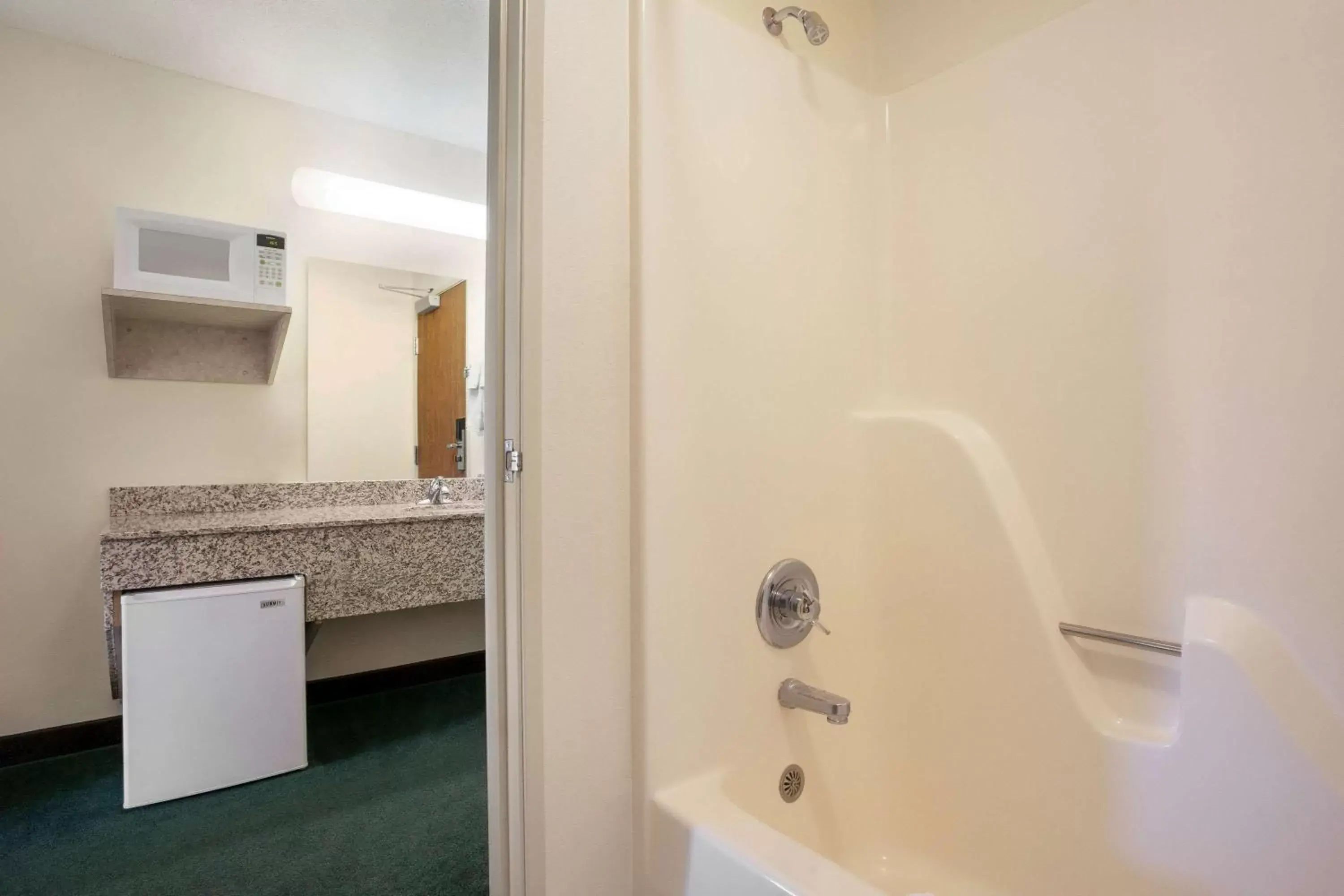 Bathroom in Travelodge by Wyndham Morrill