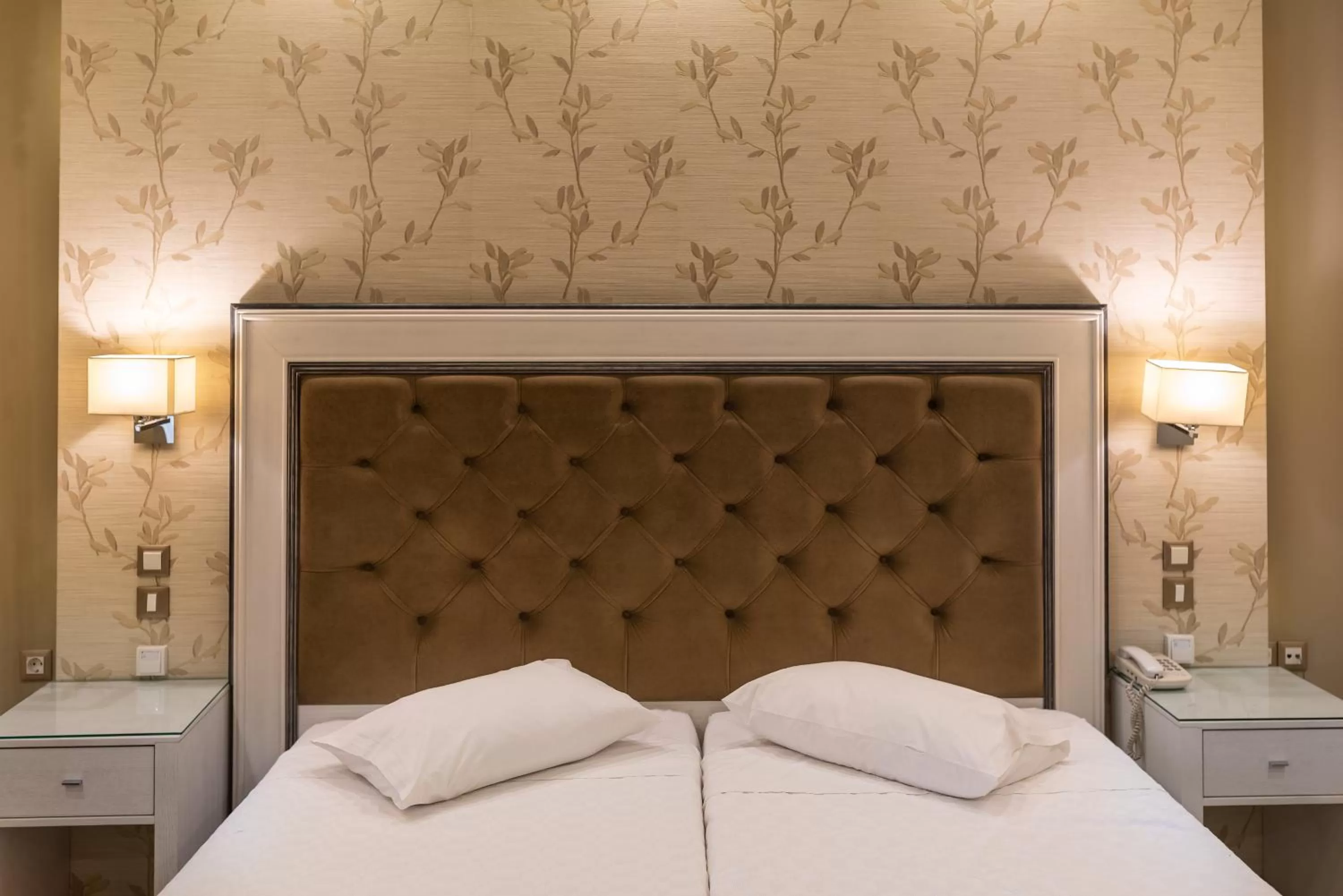 Bedroom, Bed in Heliotrope Hotels