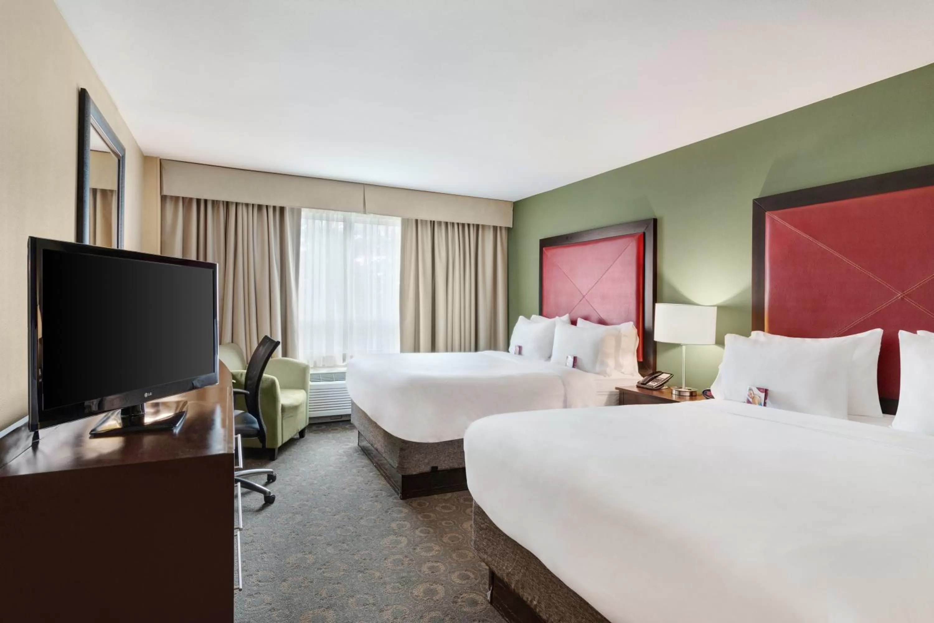 Photo of the whole room, Bed in Crowne Plaza Houston Galleria Area by IHG