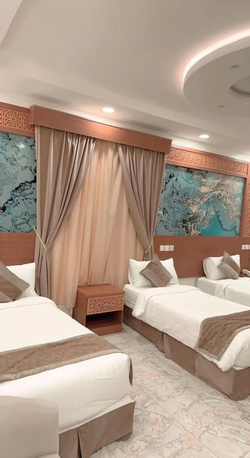 Bed in Taj Aleiman Hotel 