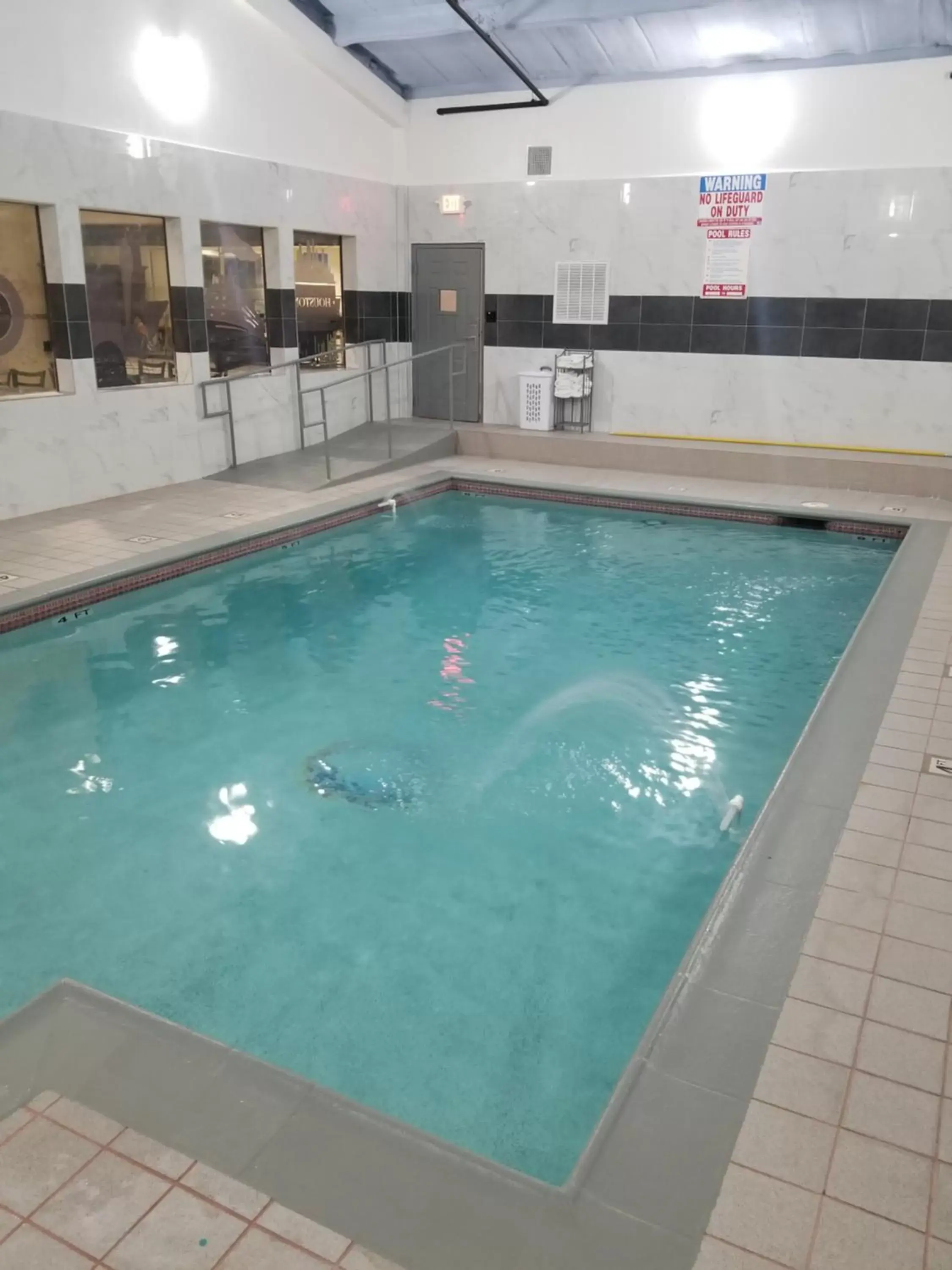 Swimming pool in Days Inn & Suites by Wyndham Webster NASA-ClearLake-Houston Swimming pool in Days Inn & Suites by Wyndham Webster NASA-ClearLake-Houston