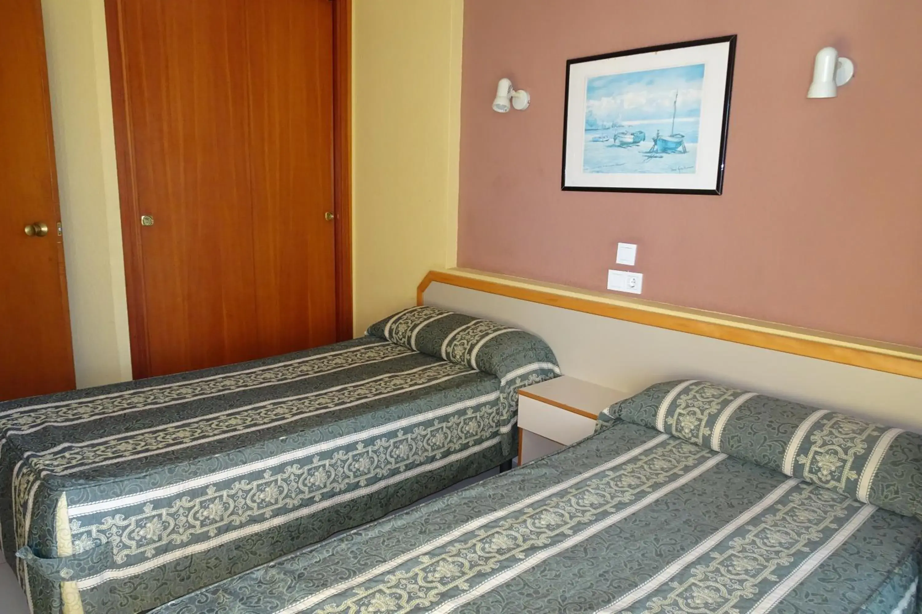 Bed in Luxmar Apartaments Bed in Luxmar Apartaments