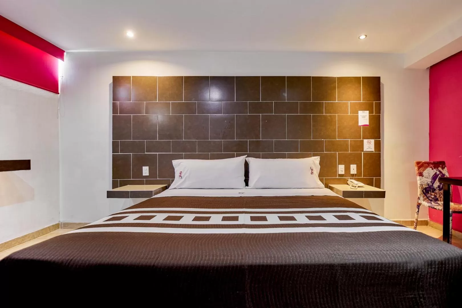 Bed in First Inn Hotel & Business