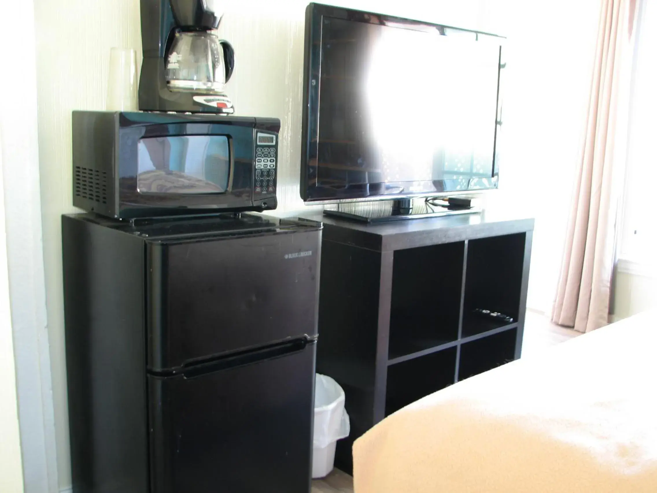 TV and multimedia, Kitchen/Kitchenette in Oceana Boutique Hotel