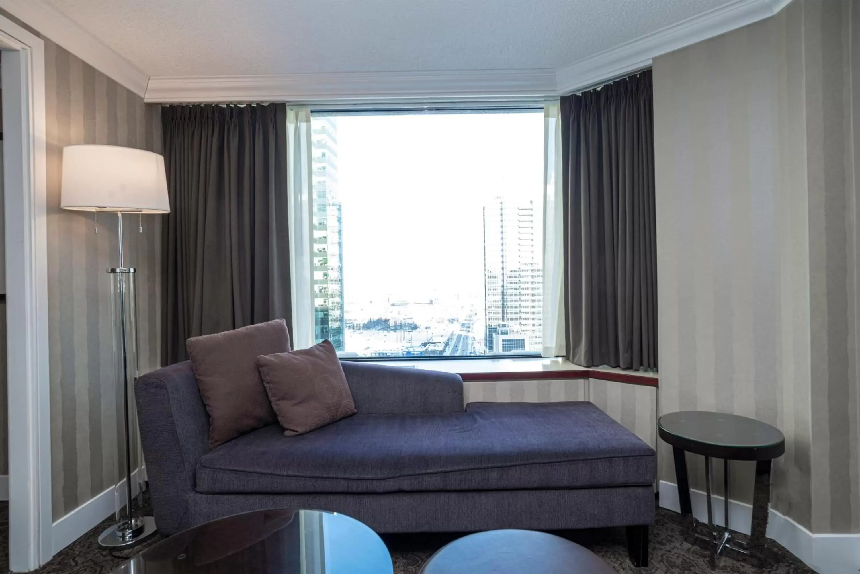 Photo of the whole room, Seating Area in Sandman Signature Edmonton Downtown Hotel