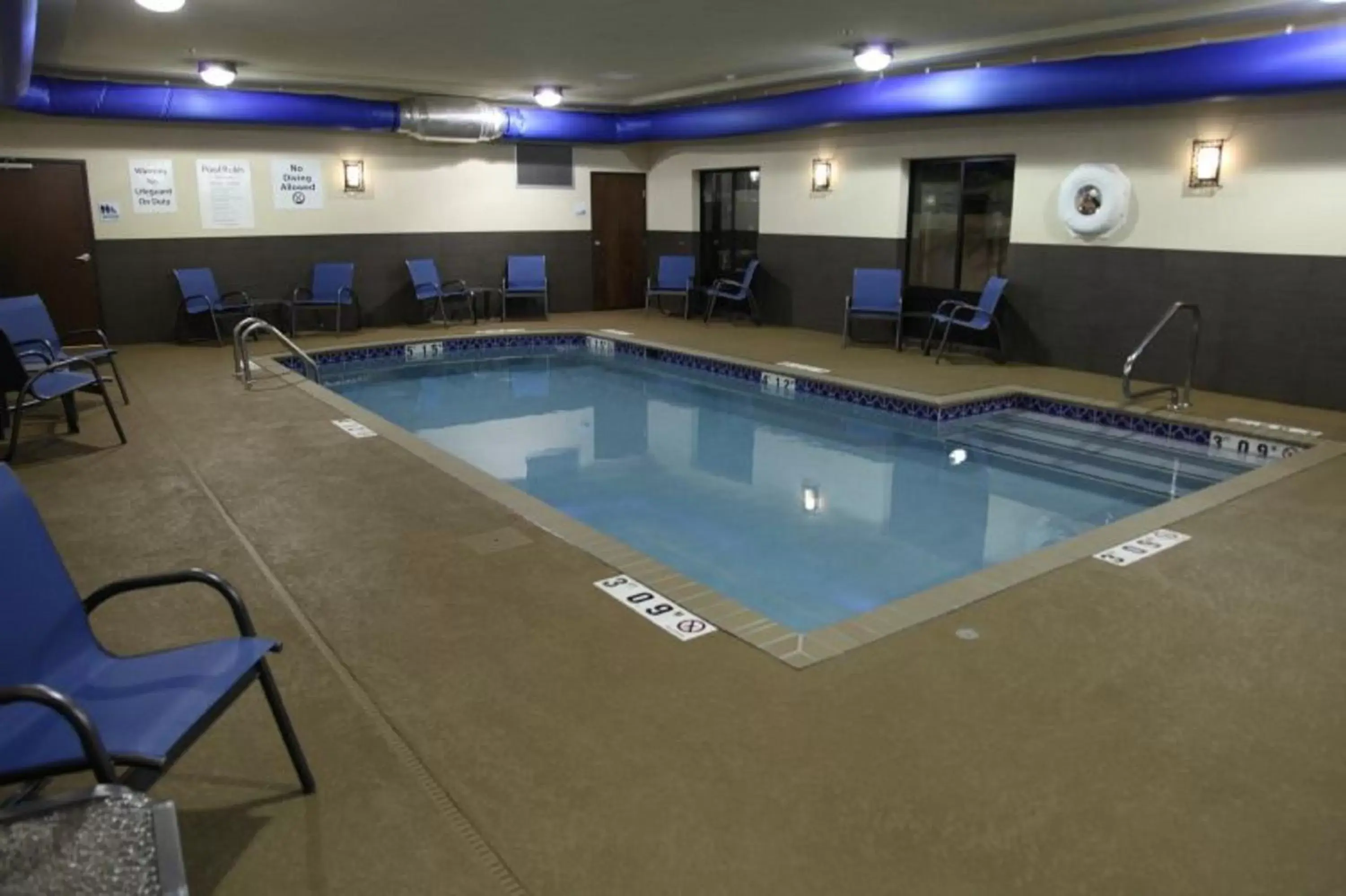 Swimming Pool in Holiday Inn Express & Suites - Huntsville Airport, an IHG Hotel