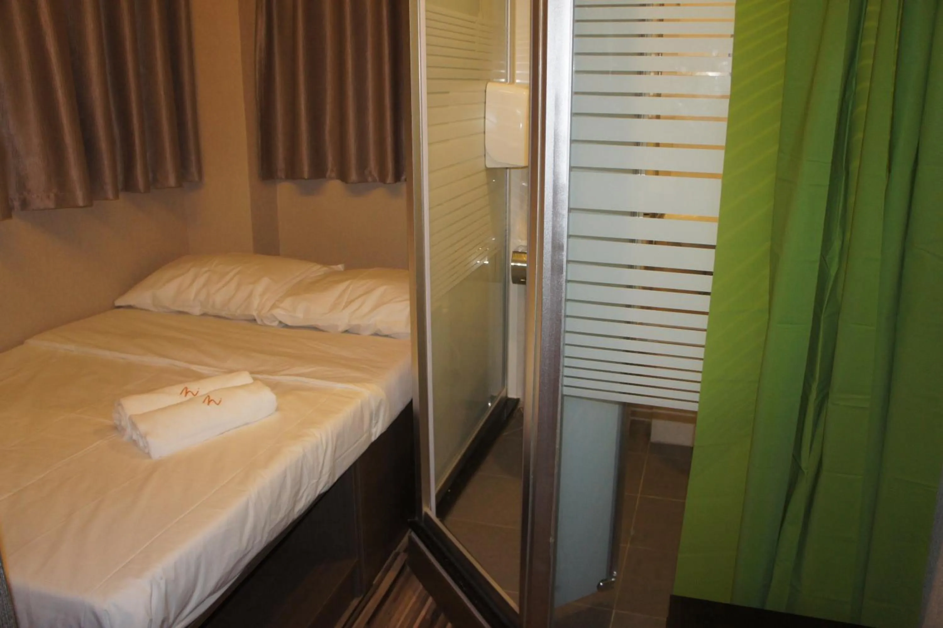 Bed in Homy Inn North Point