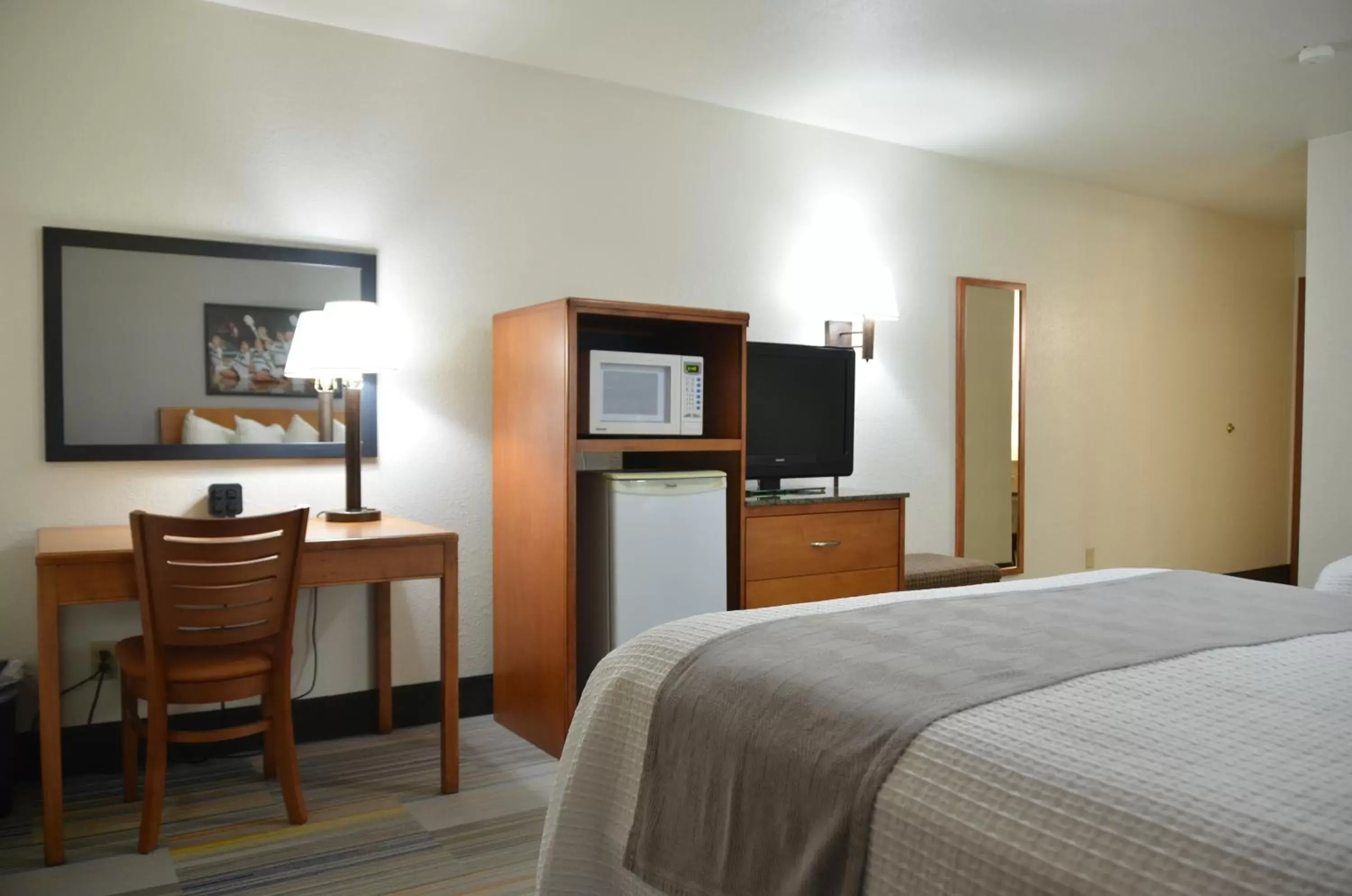 Bed in Bearcat Inn and Suites