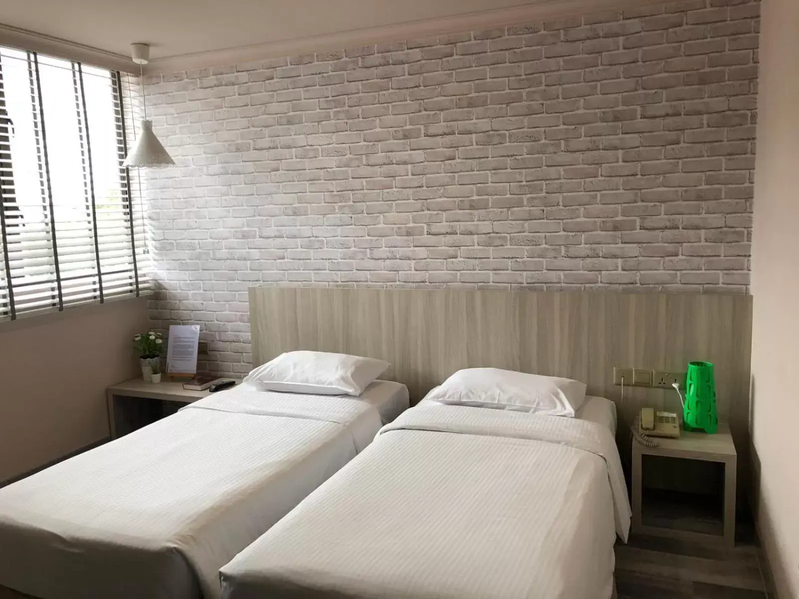 Bed in YMCA One Orchard Bed in YMCA One Orchard