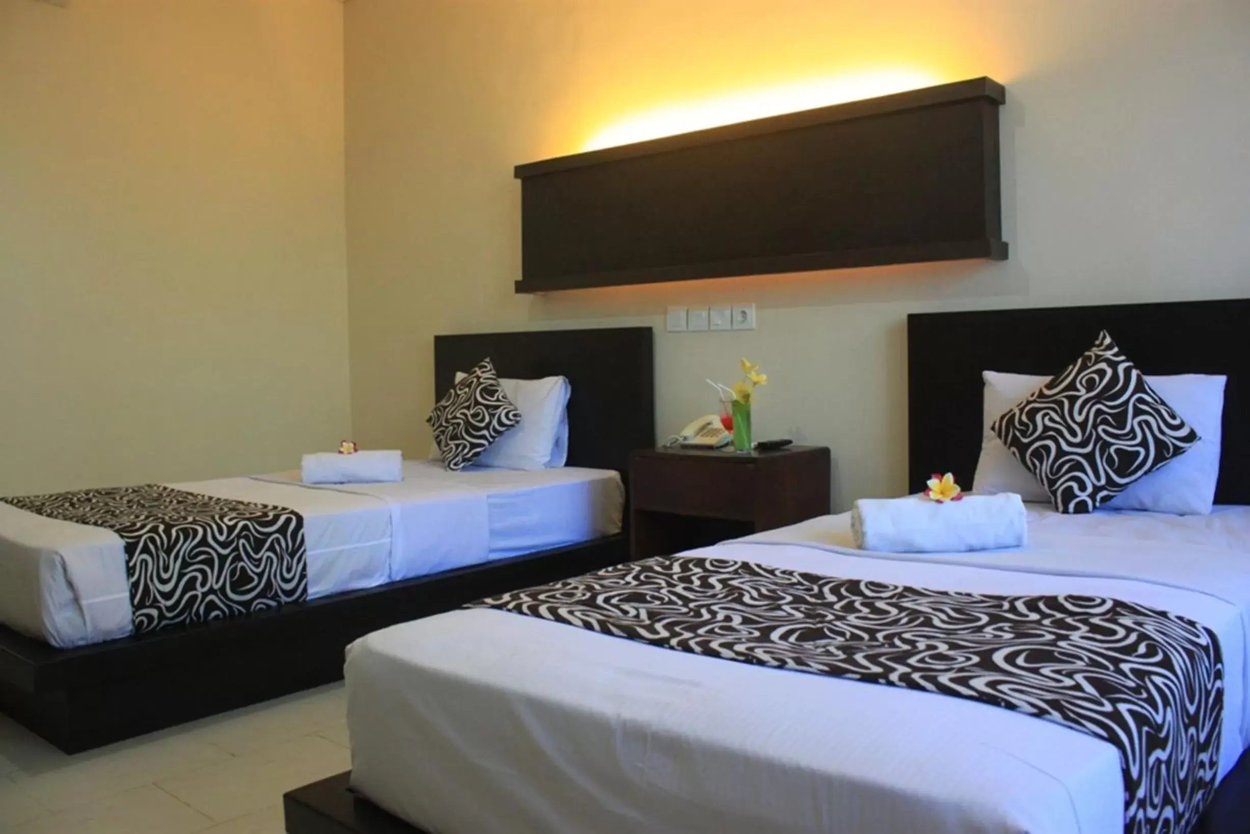 Bed in Bakung Beach Resort