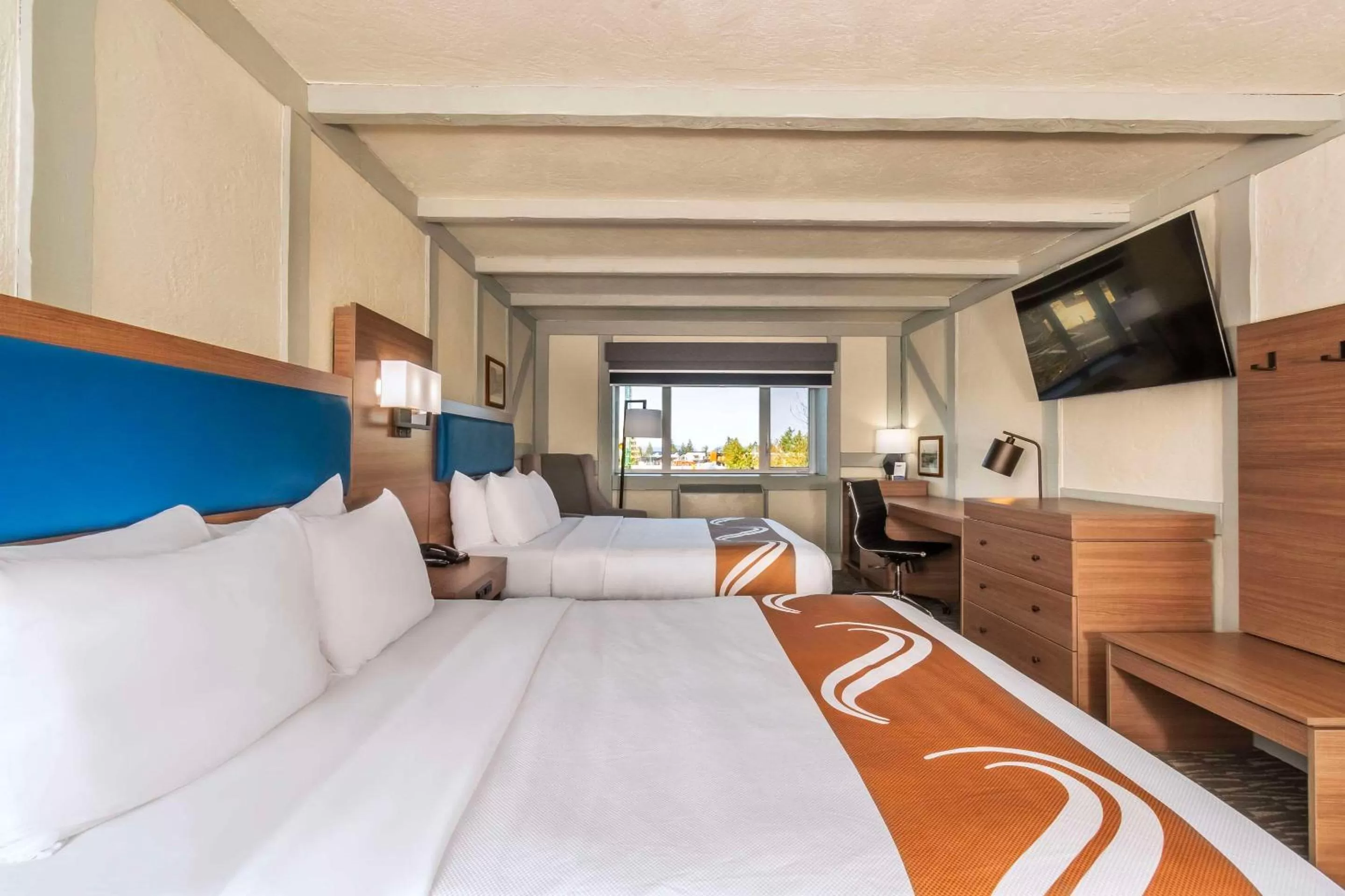 Bedroom, Bed in Quality Inn Waddling Dog