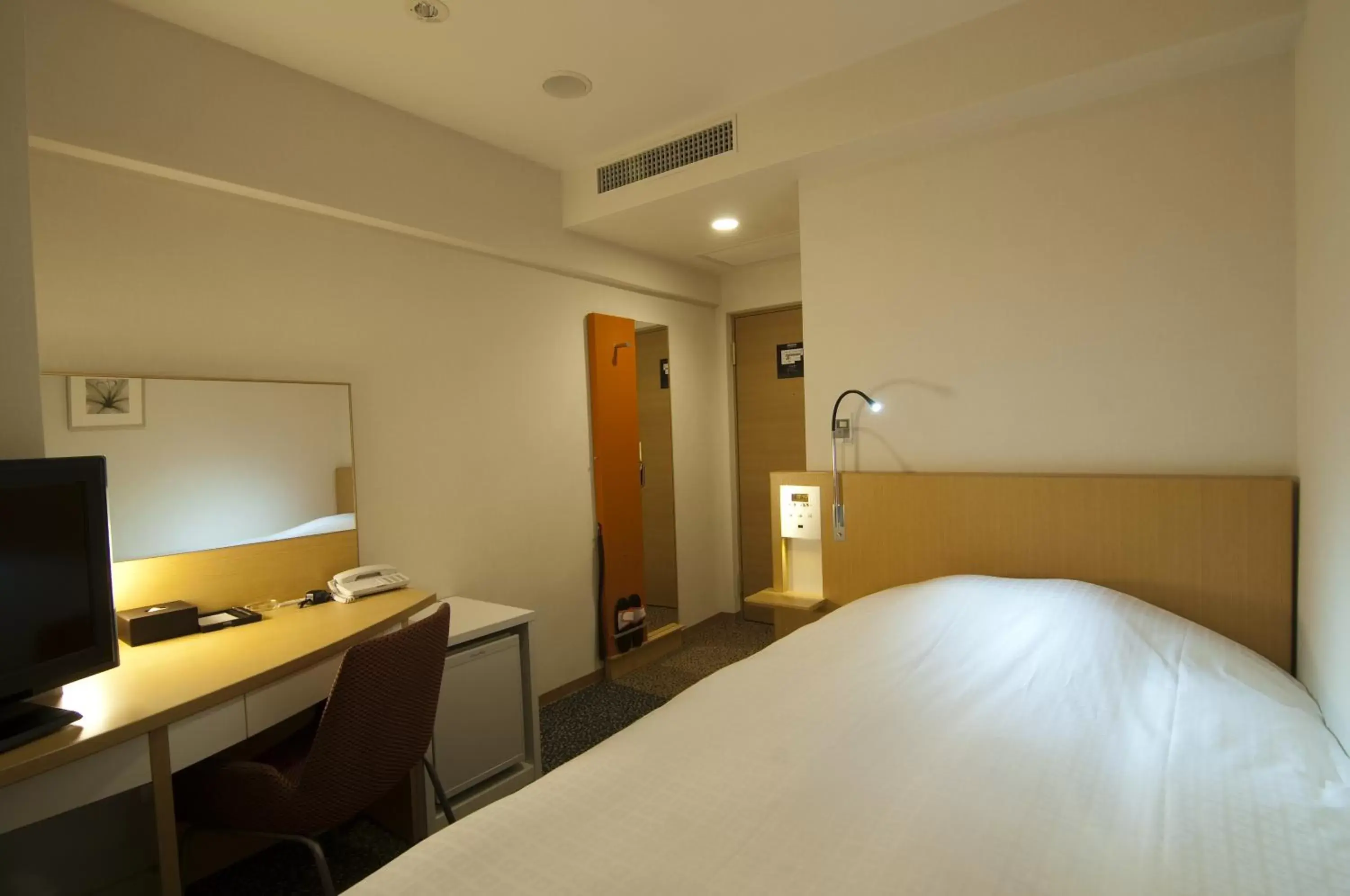 Bed in Hotel Sunflex Kagoshima