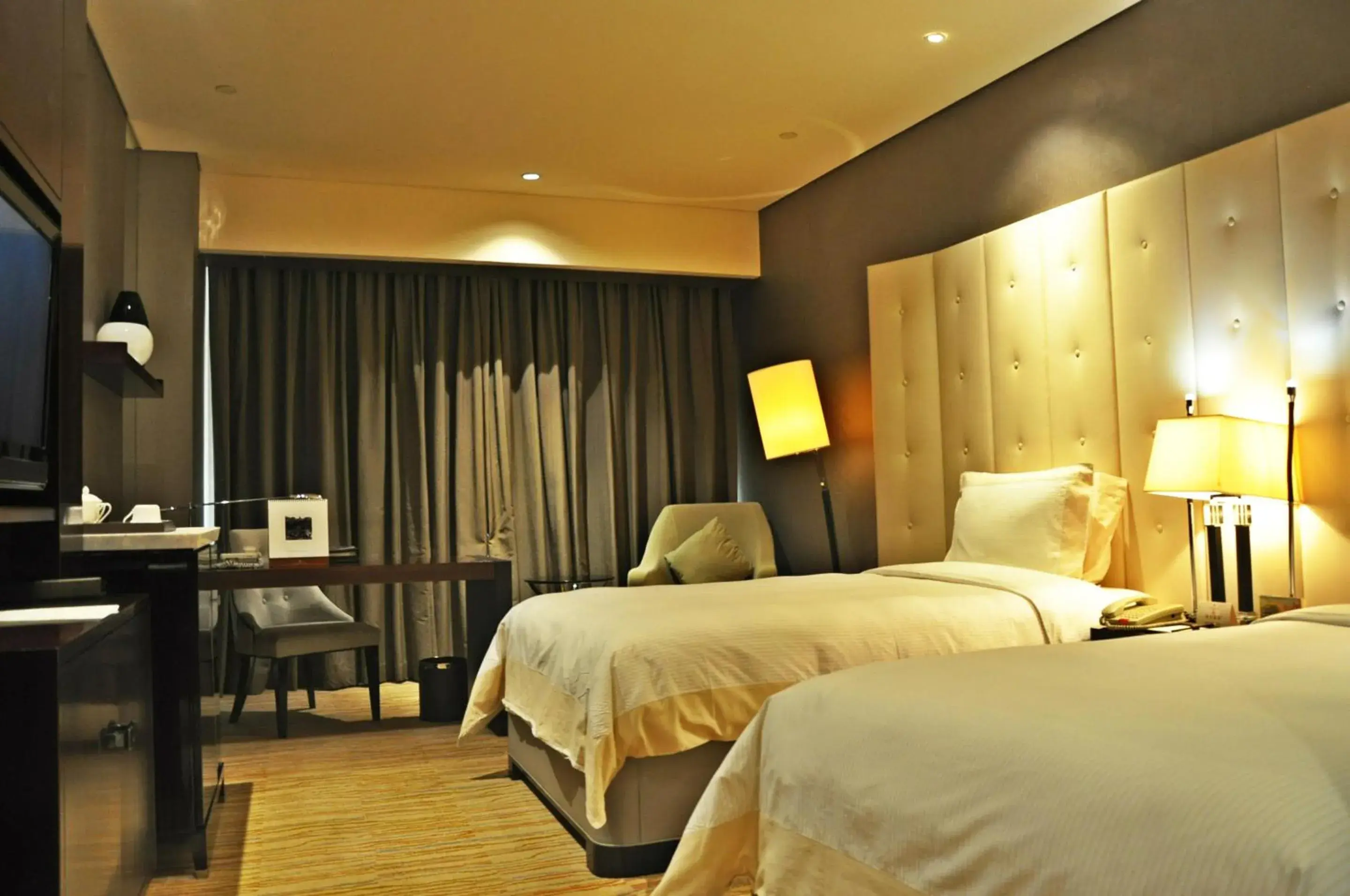 Bed in Royal International Hotel