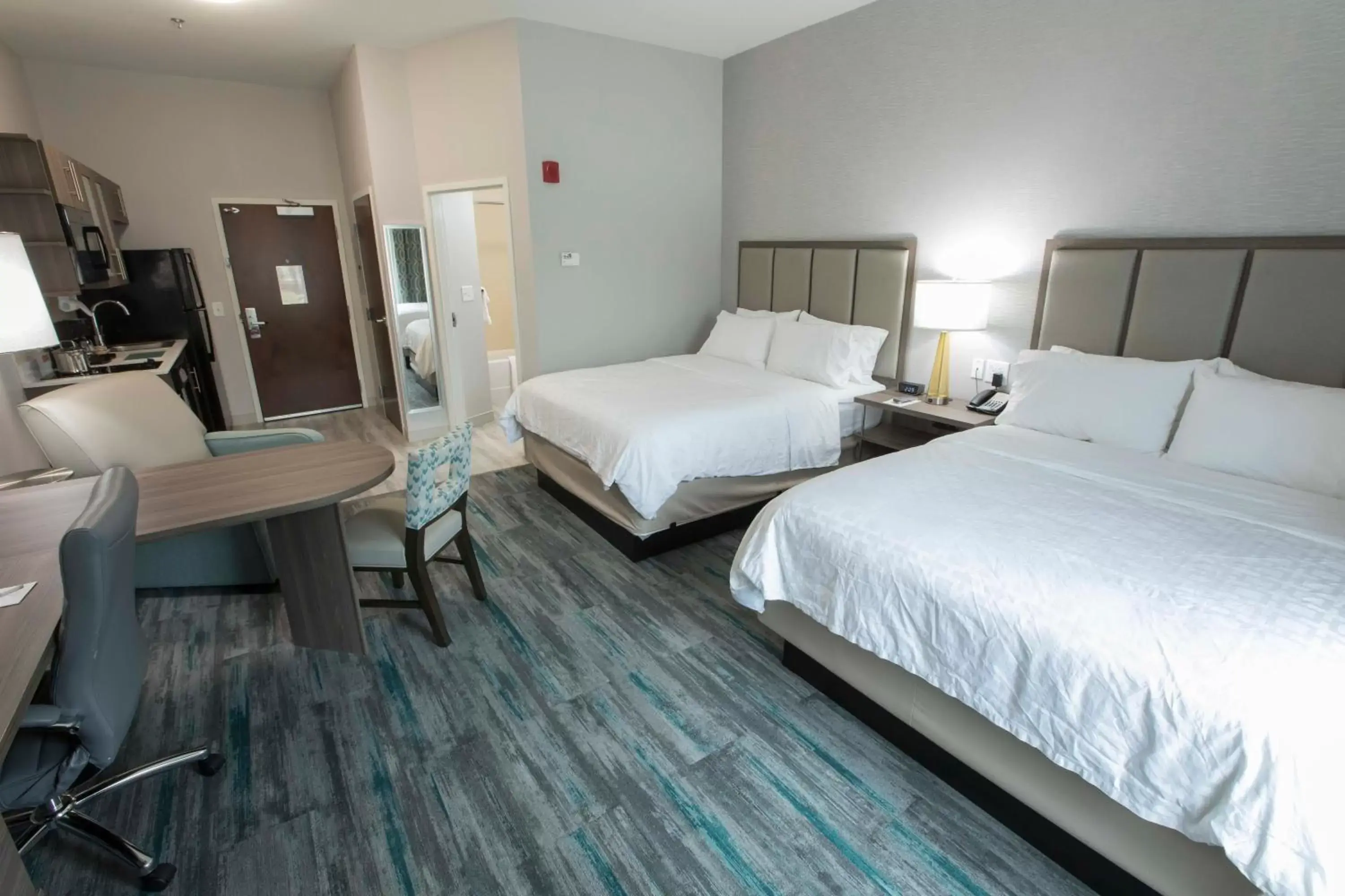 Photo of the whole room, Bed in Candlewood Suites - McDonough, an IHG Hotel