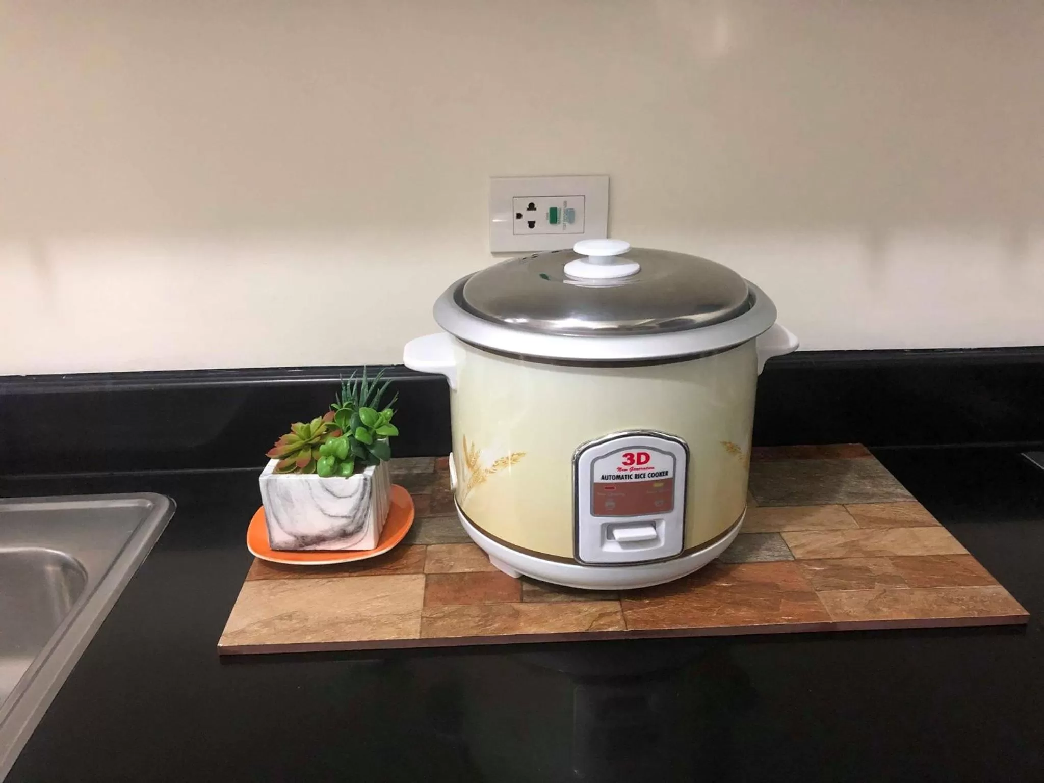 Kitchen or kitchenette in Green Residences Staycation by PBYY