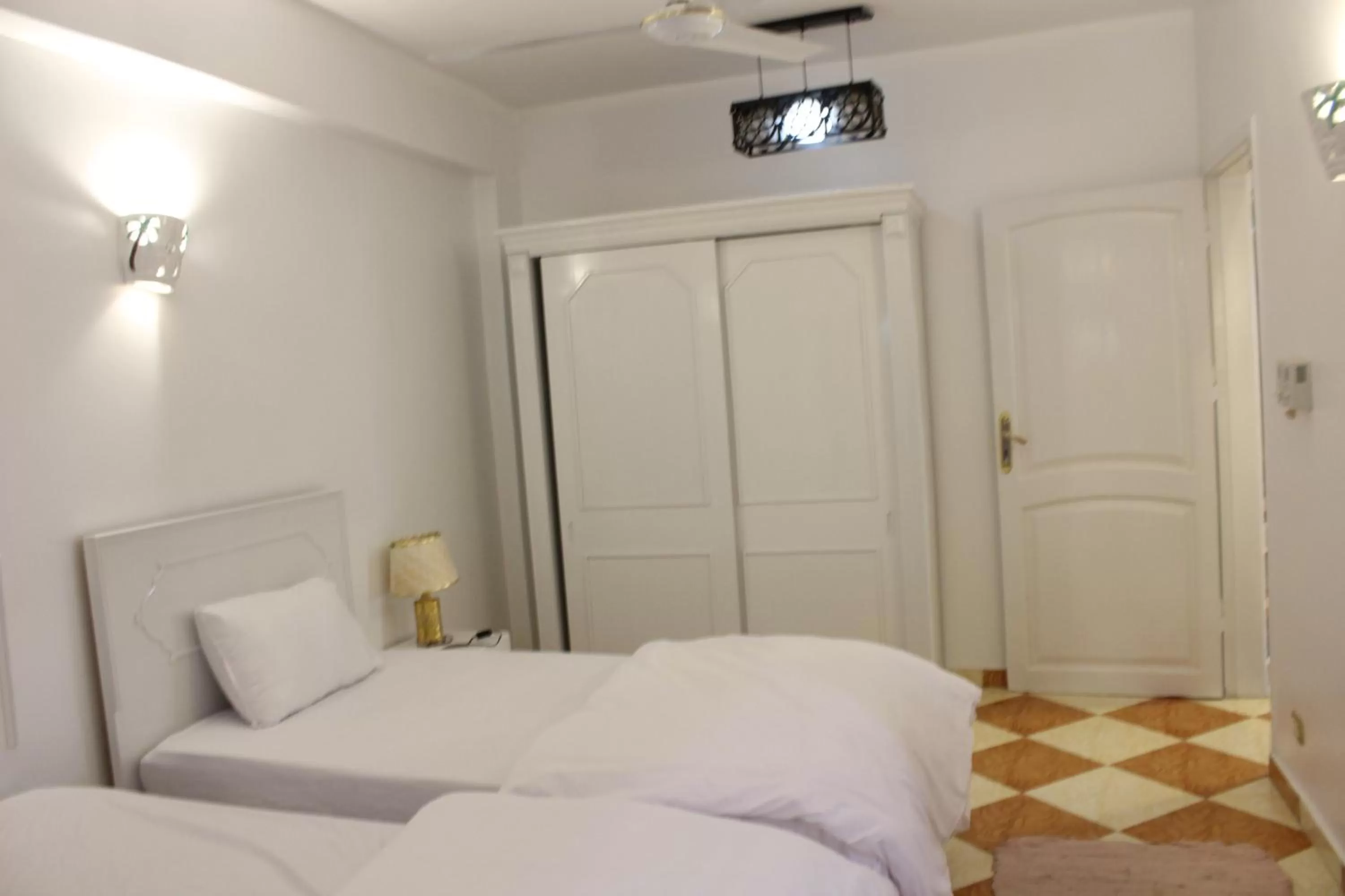 Bed in Mama Africa Apts & Studios