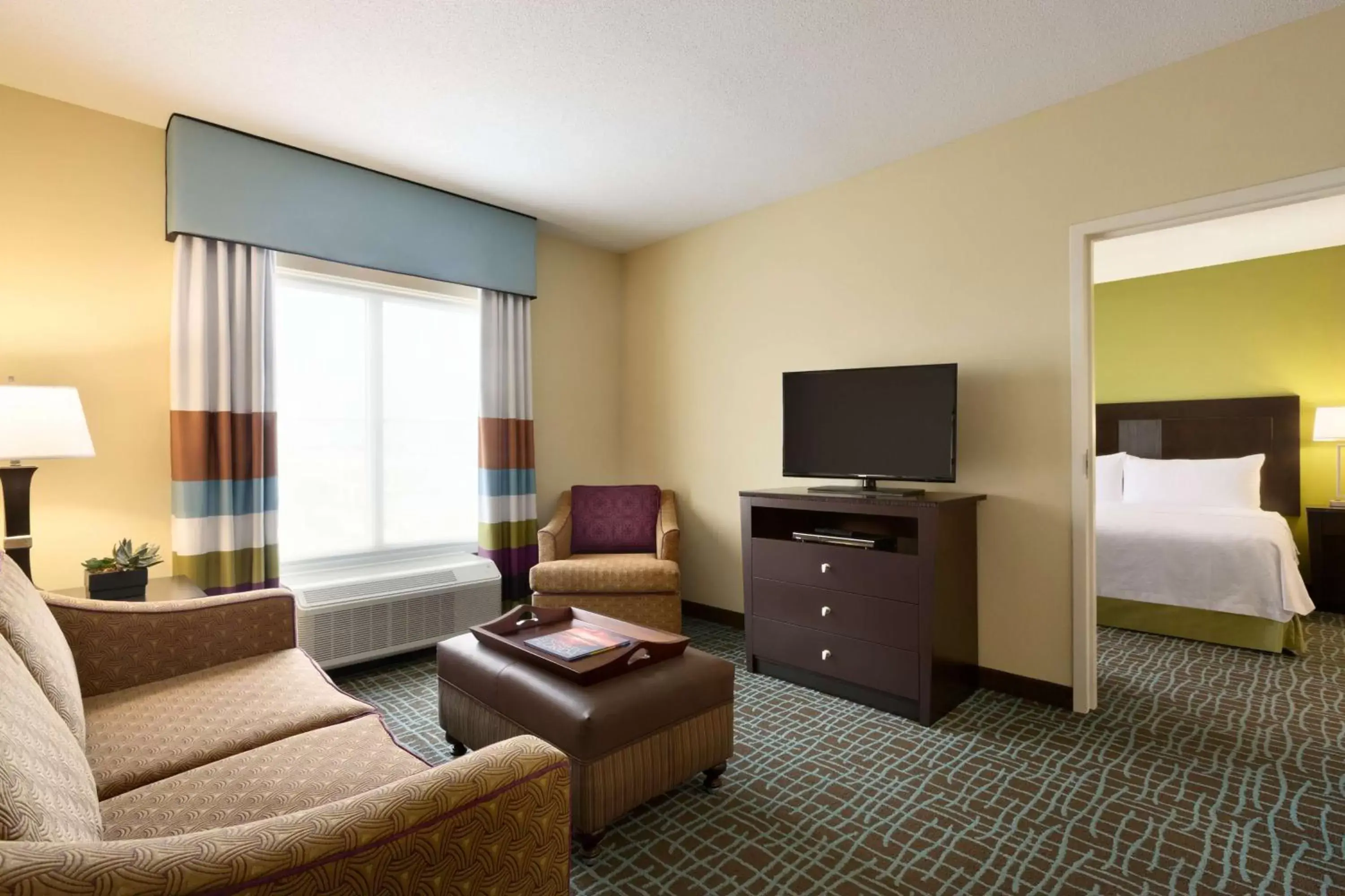 Bedroom, Seating Area in Homewood Suites Fort Myers Airport - FGCU