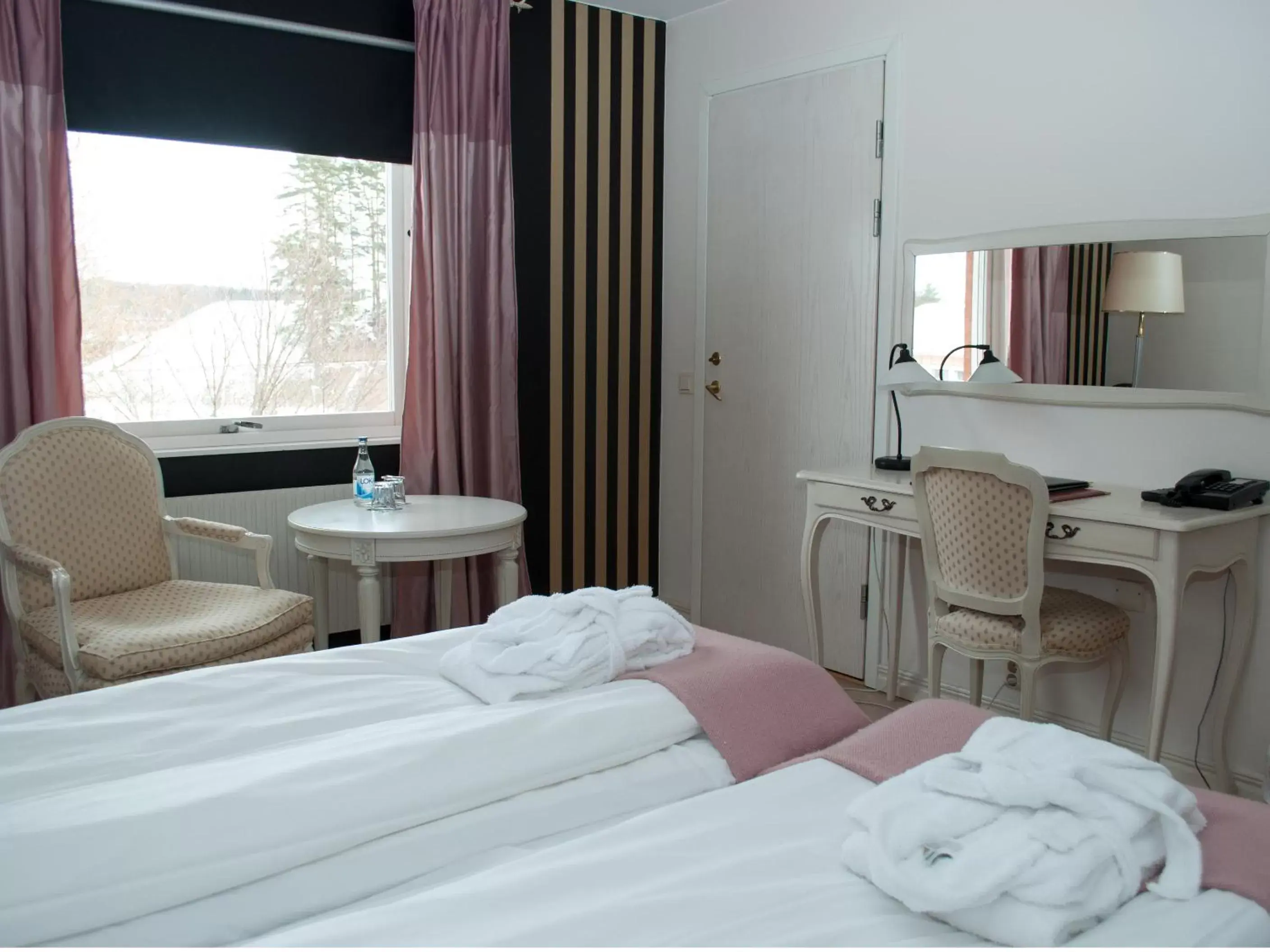 Bed in First Hotel Olofström