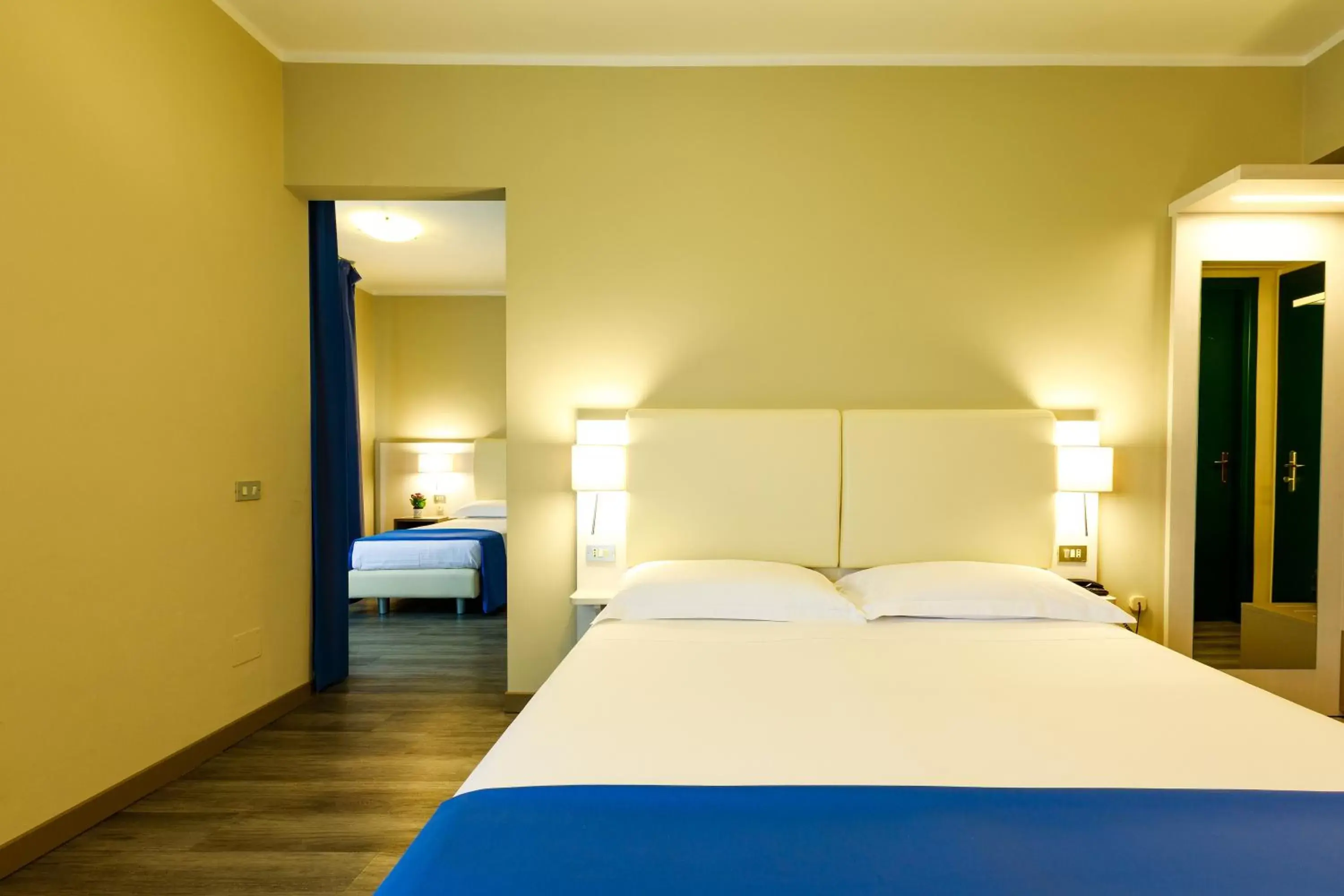 Bed in Hotel Oleggio Malpensa