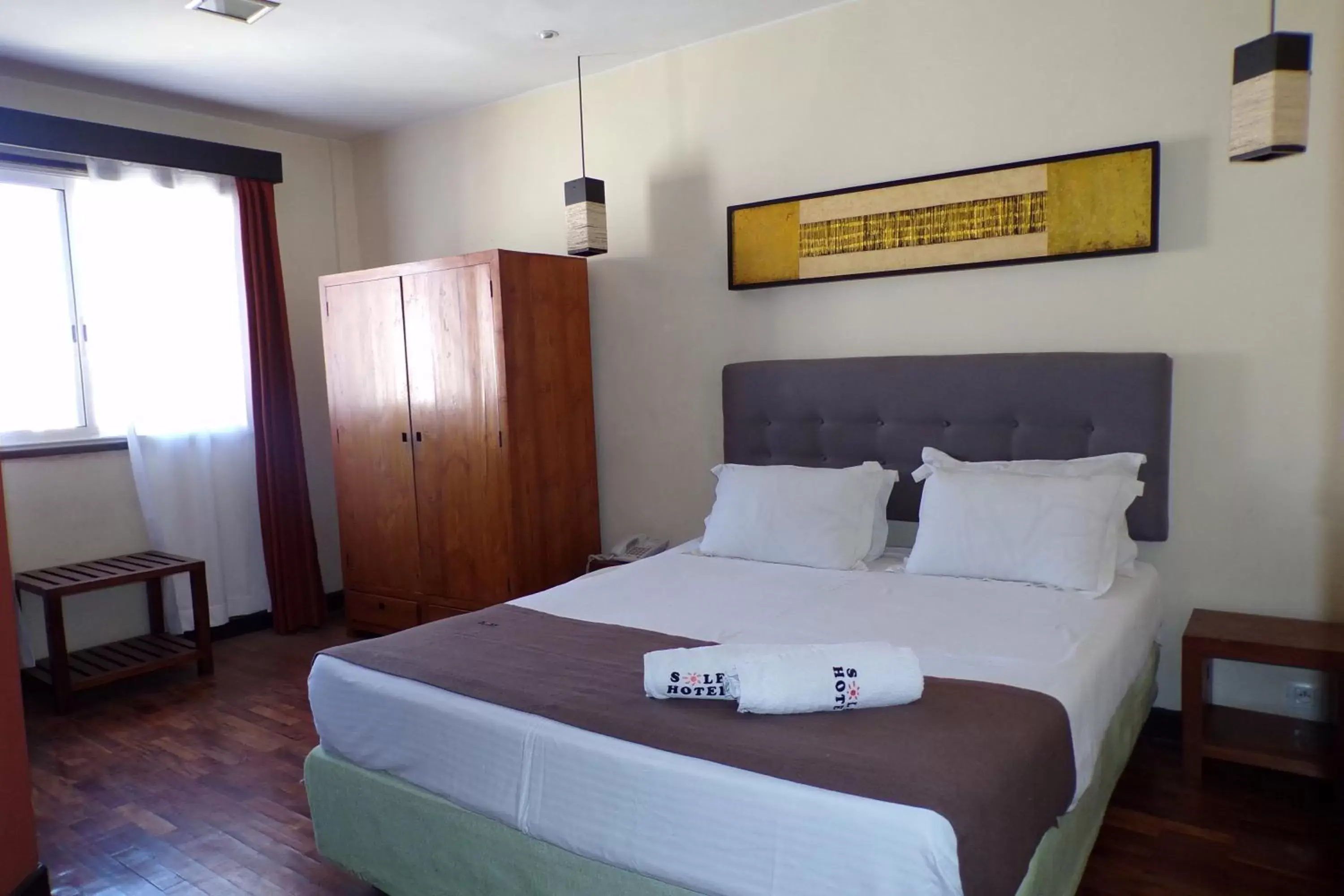 Property building, Bed in Sole Hotel