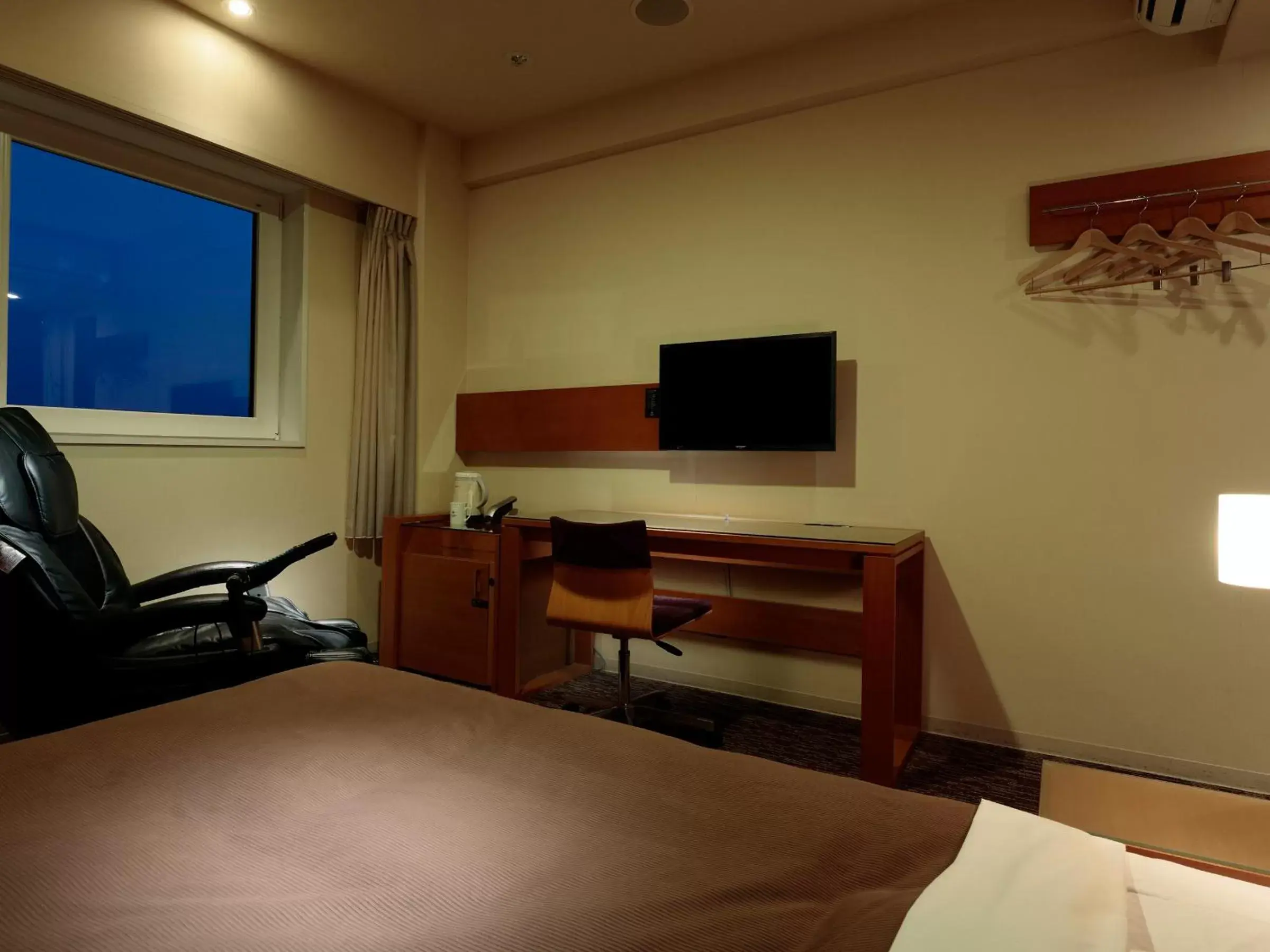 Photo of the whole room, TV/Entertainment Center in Candeo Hotels Kameyama
