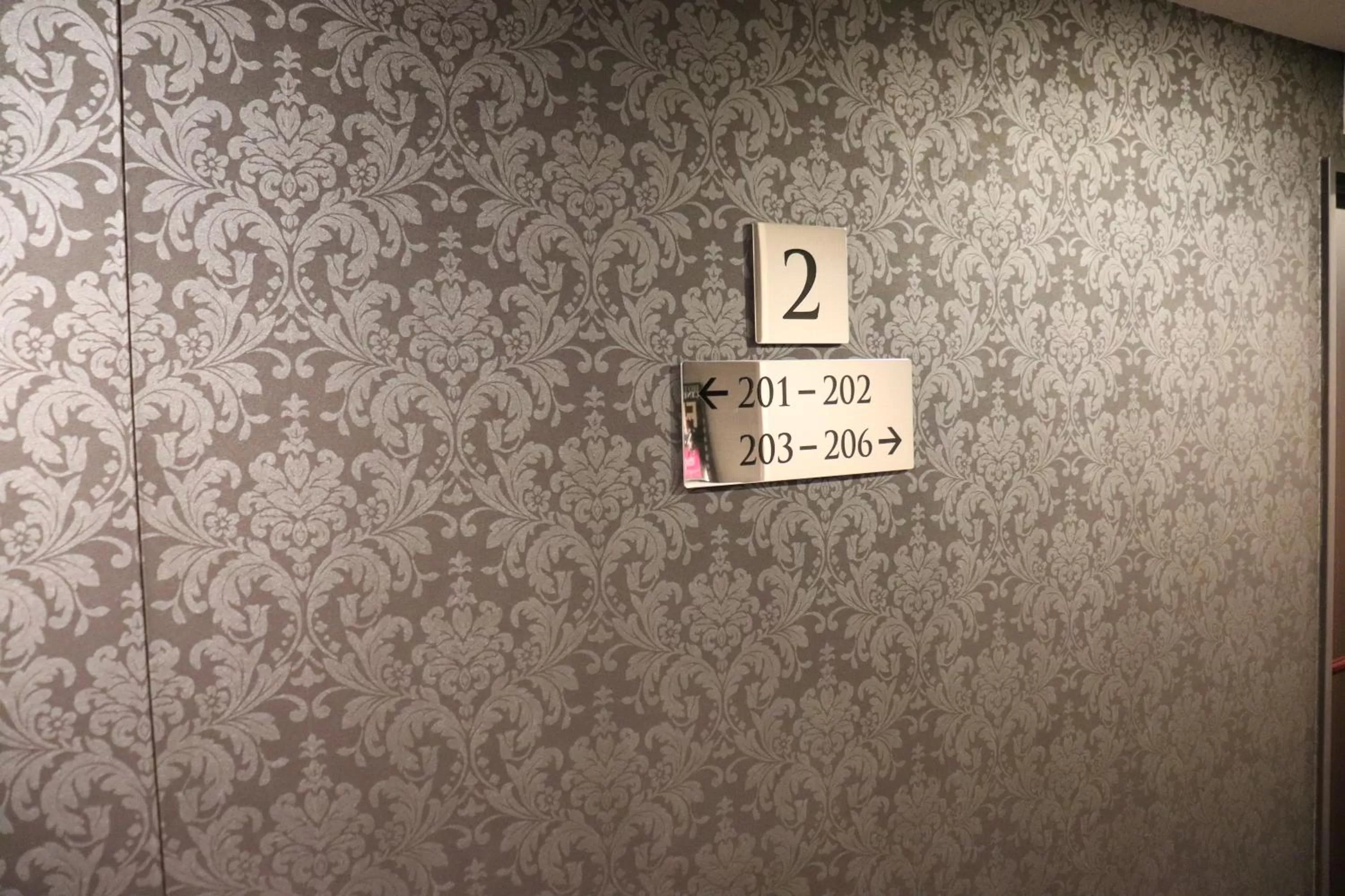 Property logo or sign in Hotel. Links Namba