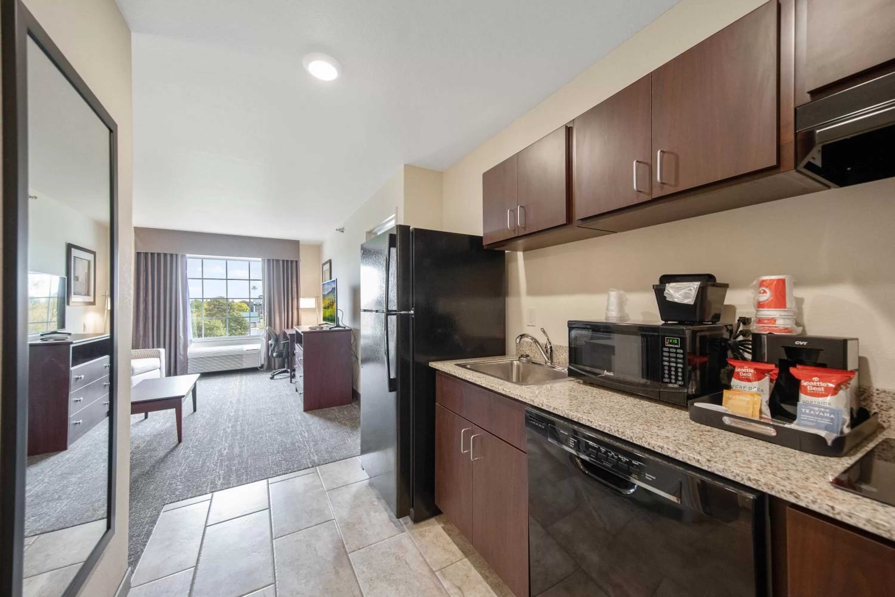 Kitchen or kitchenette in Cobblestone Hotel & Suites - Austin