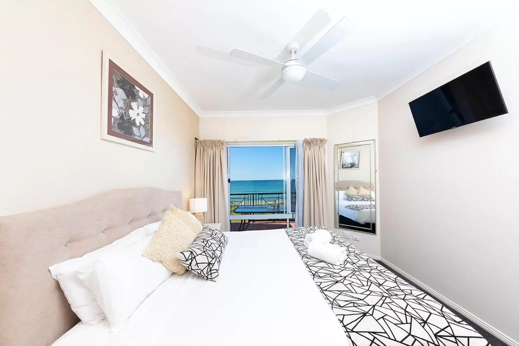 Bed in Meridian Beachside Apartments