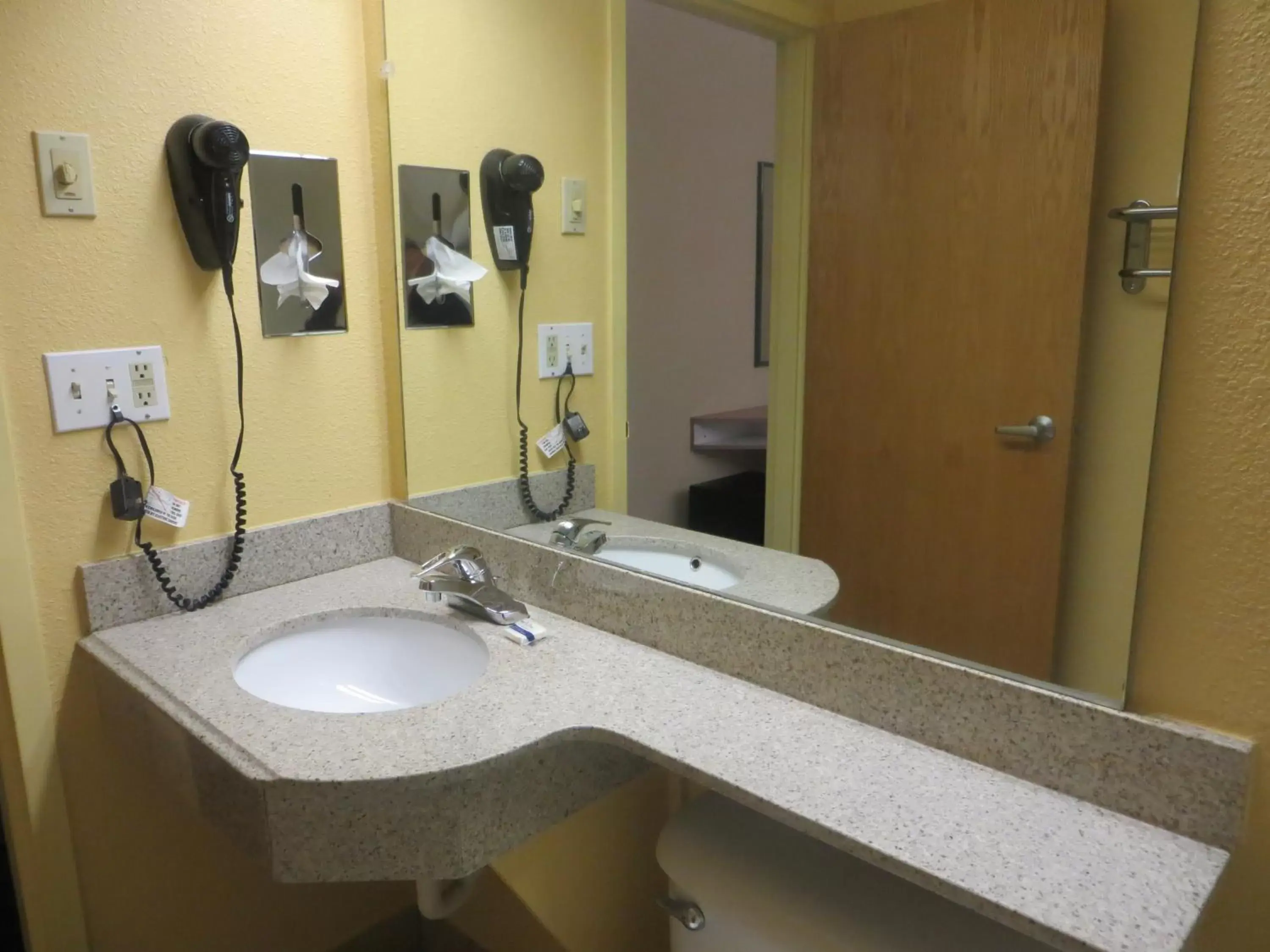 Bathroom in Microtel Inn by Wyndham Knoxville