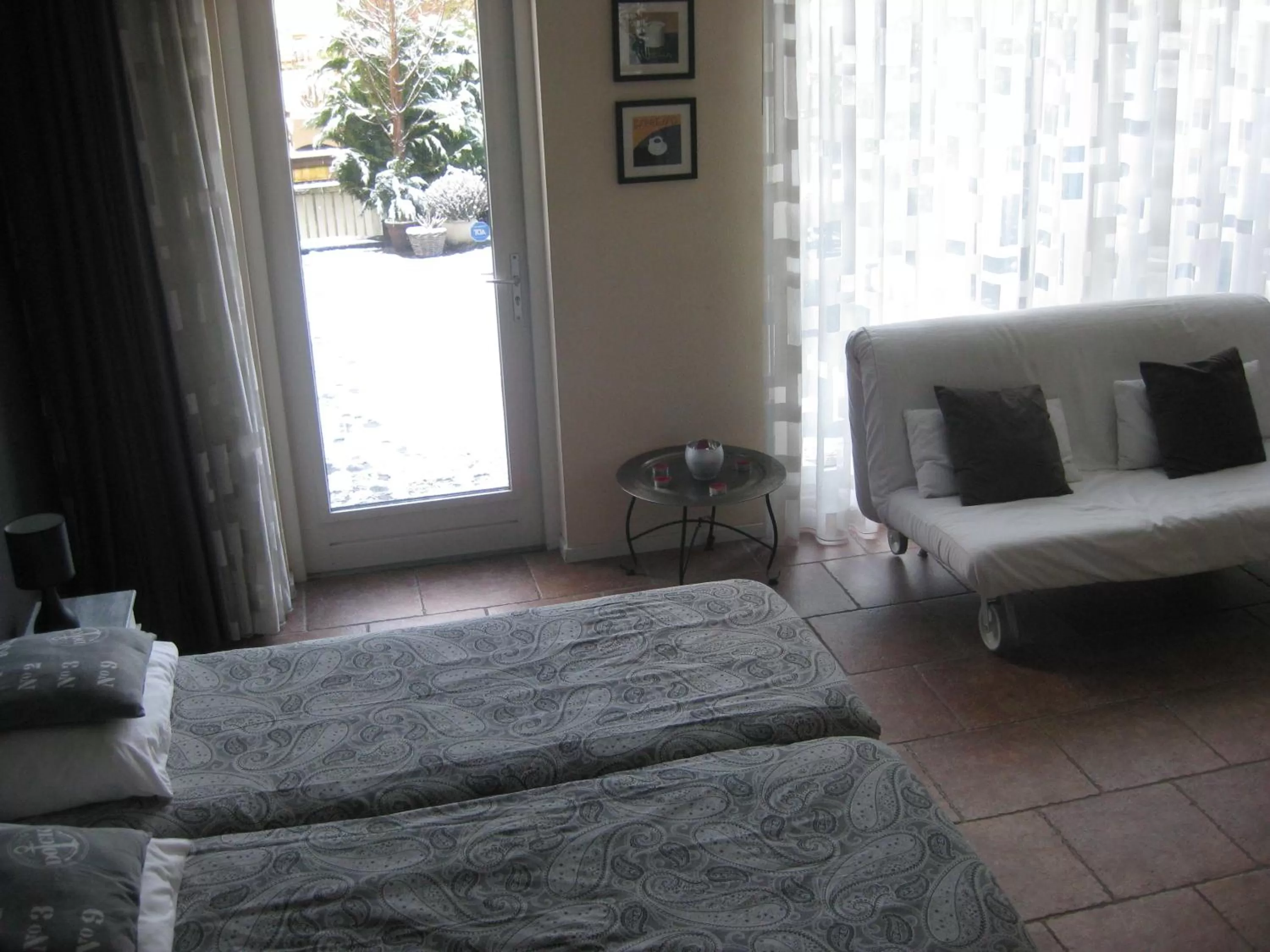 Bed, Seating Area in Quarenta Studio