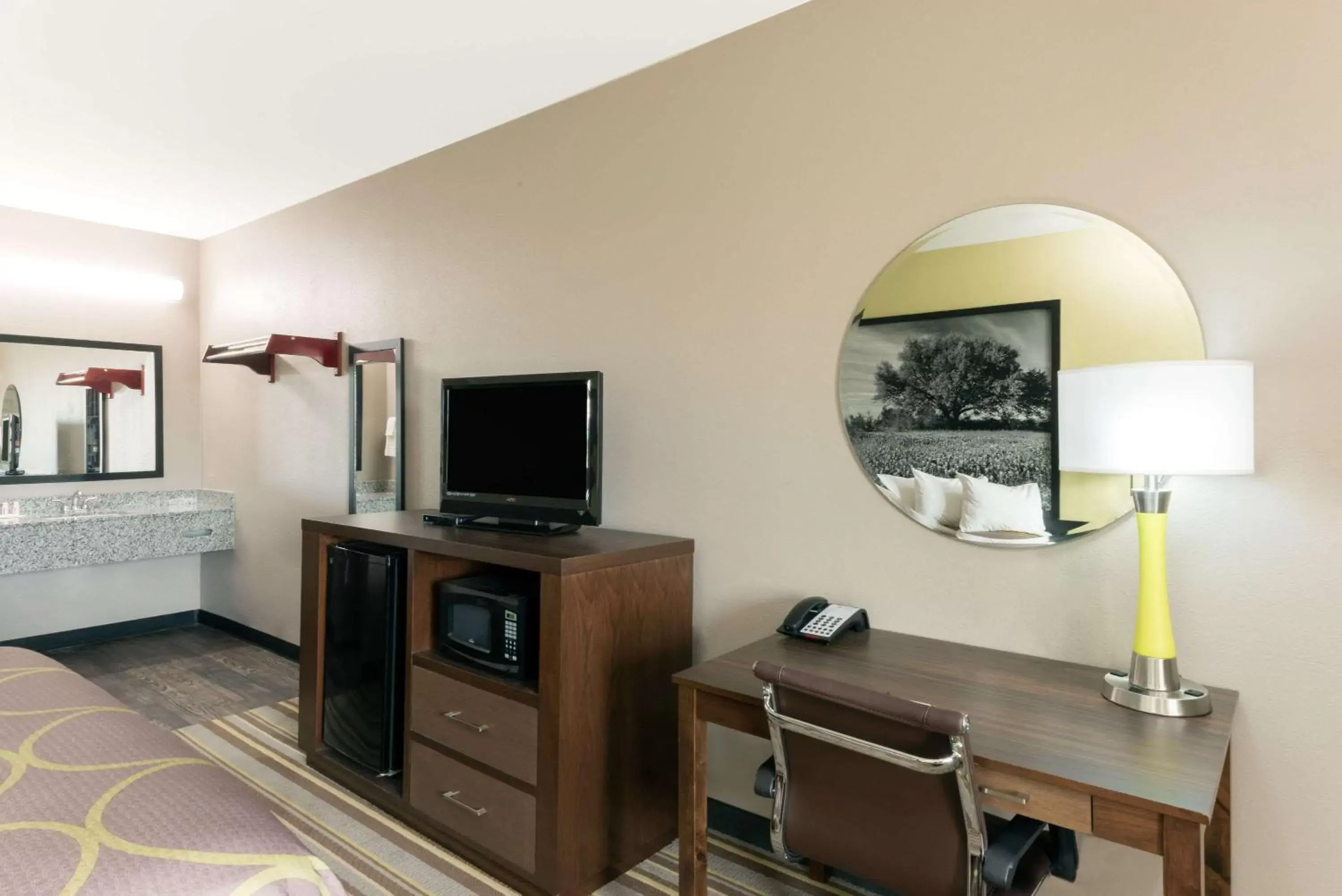 Photo of the whole room, TV/Entertainment Center in Super 8 by Wyndham Colorado City